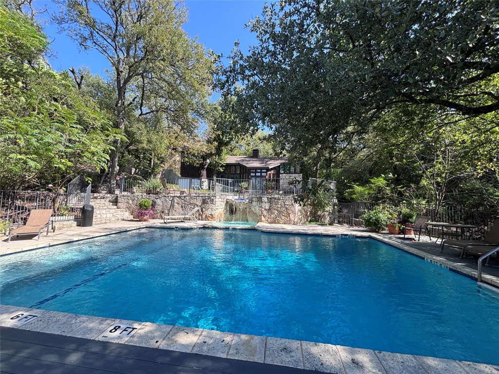 4711 Spicewood Springs Road, Unit 2112 Austin, TX 78759 - Photo 27 of 29 a view of a swimming pool with an outdoor space