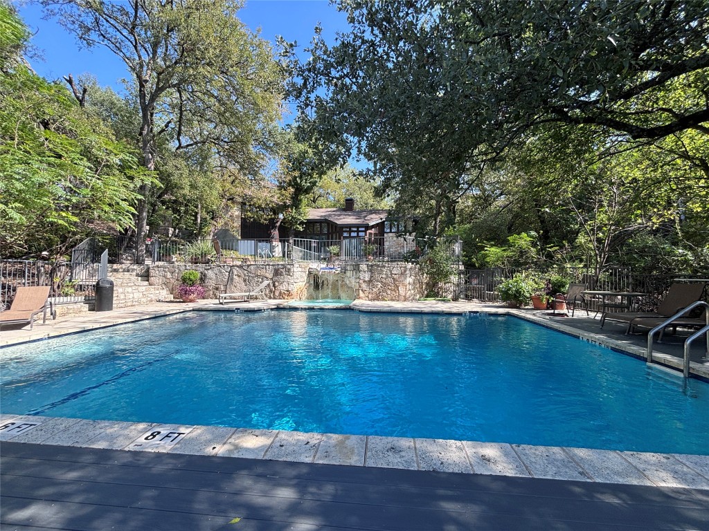 4711 Spicewood Springs Road, Unit 2112 Austin, TX 78759 - Photo 28 of 29 a view of a swimming pool with an outdoor space