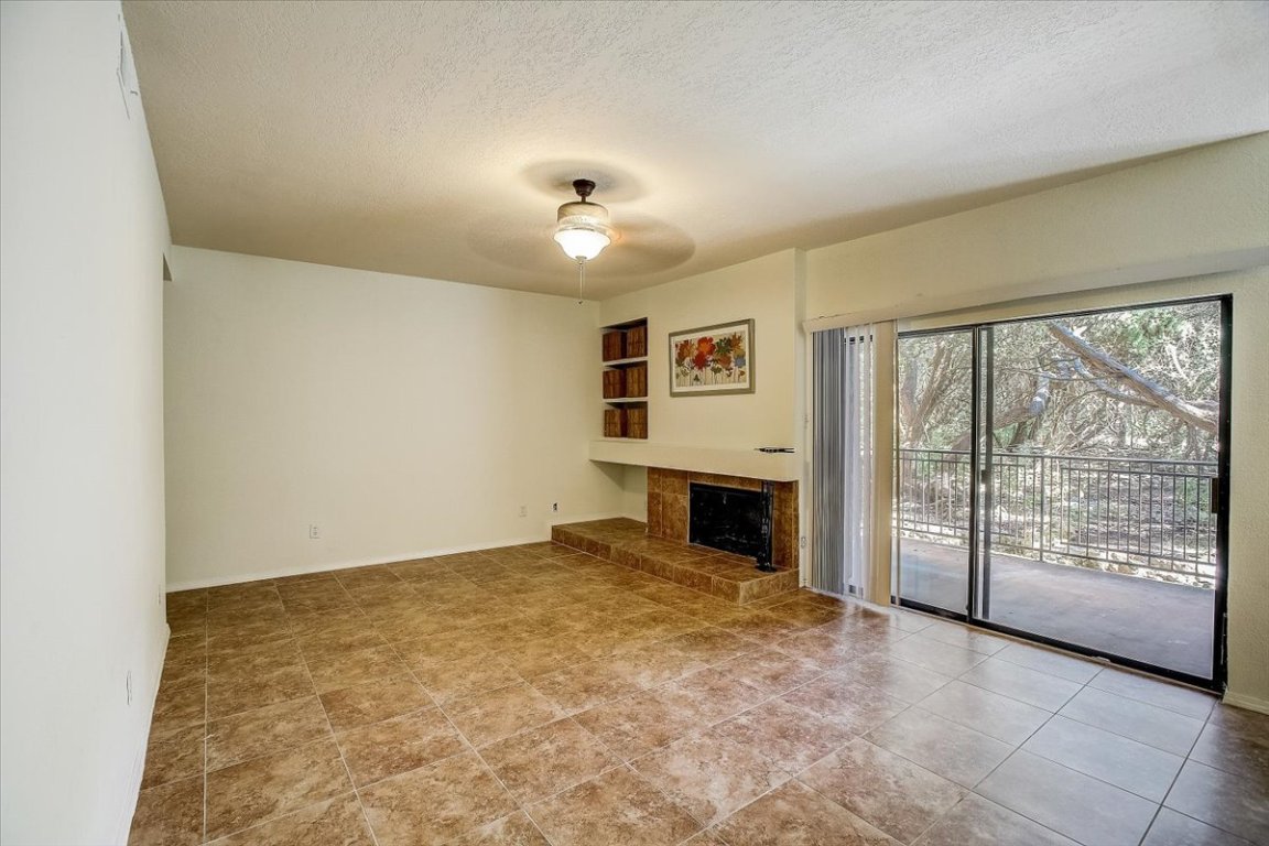 4711 Spicewood Springs Road, Unit 2112 Austin, TX 78759 - Photo 5 of 29 an empty room with windows