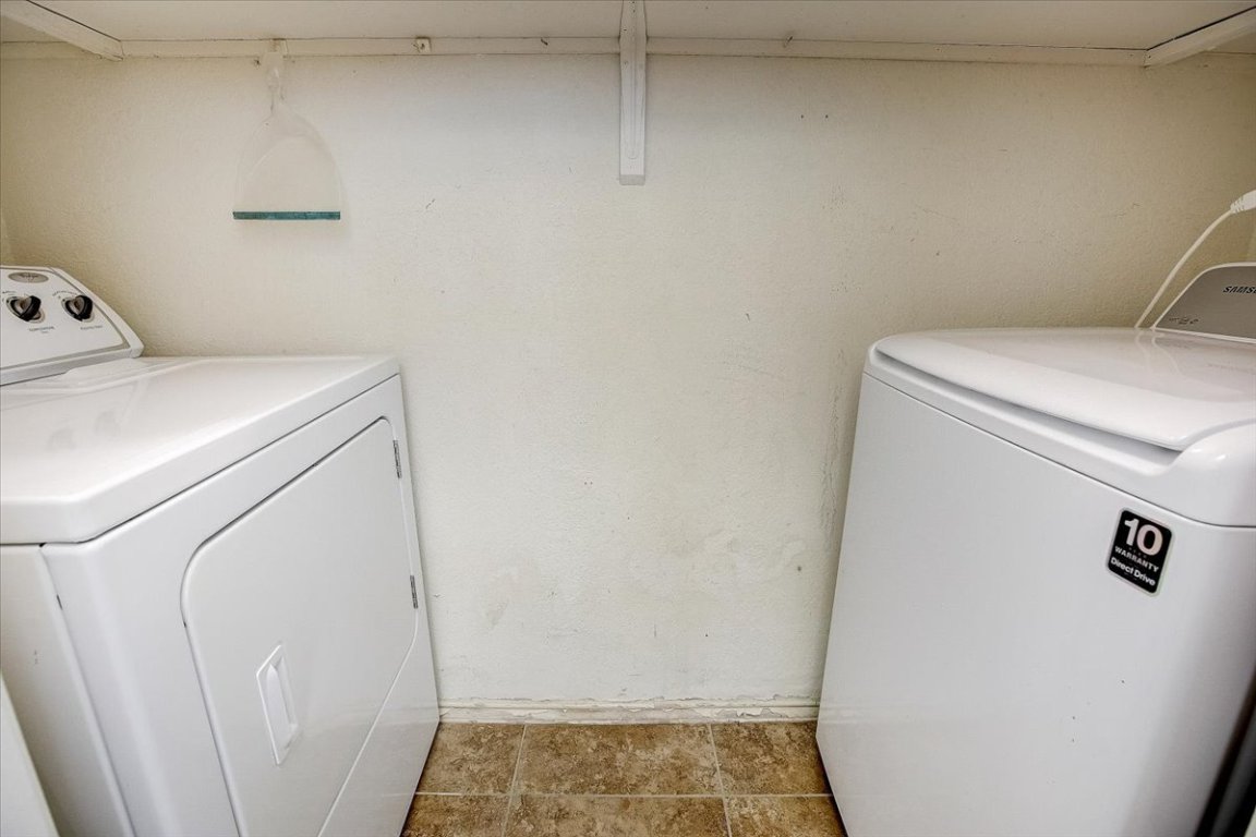 4711 Spicewood Springs Road, Unit 2112 Austin, TX 78759 - Photo 10 of 29 a utility room with dryer and washer