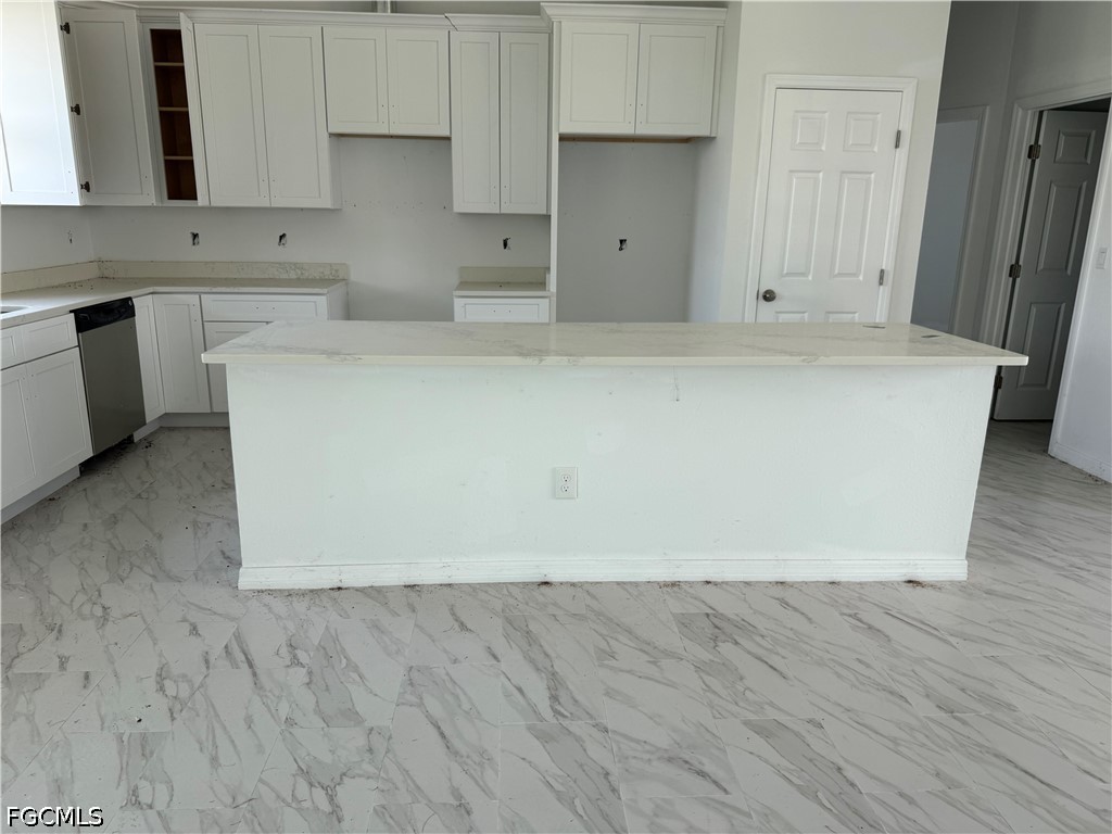 10658 Rainsville Street Port Charlotte, FL 33981 - Photo 10 of 21 a view of kitchen with wooden floor