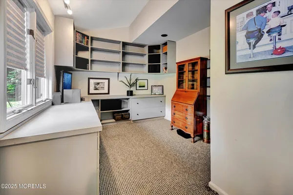 a room with furniture and storage