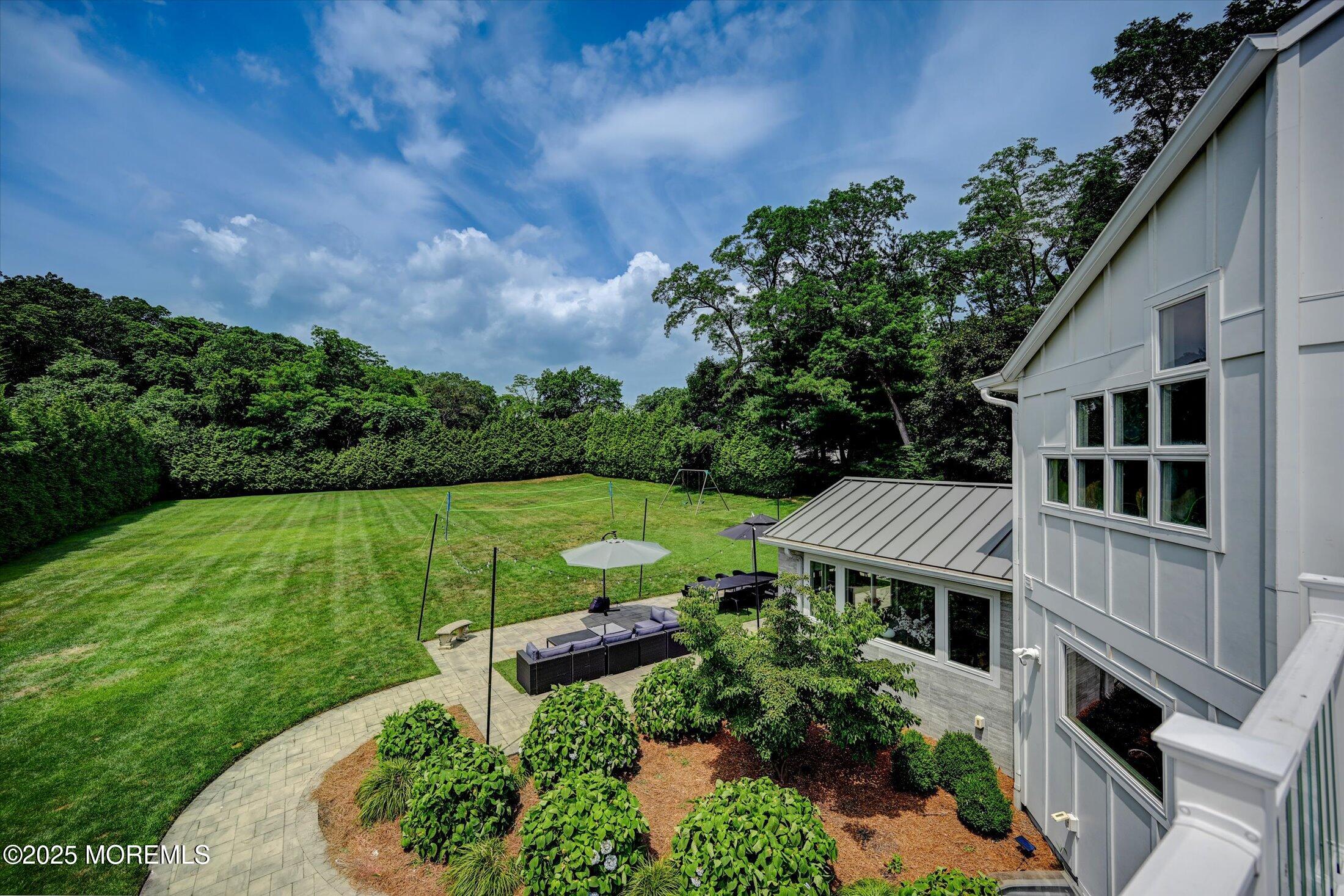 3 Woods Road West Long Branch, NJ 07764 - Photo 19 of 46 aerial view of a house with a yard