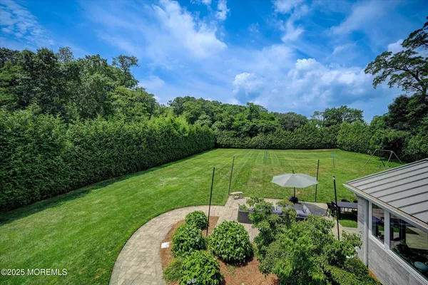 a view of a garden with an outdoor space