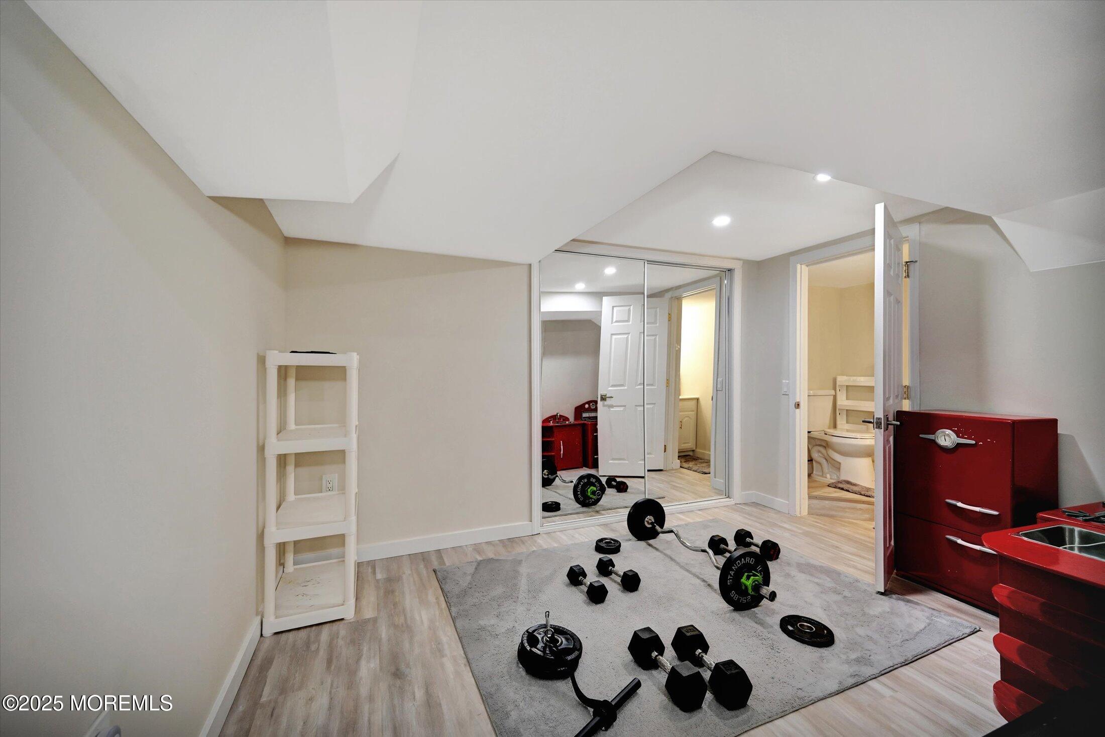 3 Woods Road West Long Branch, NJ 07764 - Photo 30 of 46 a bathroom with a sink and a mirror