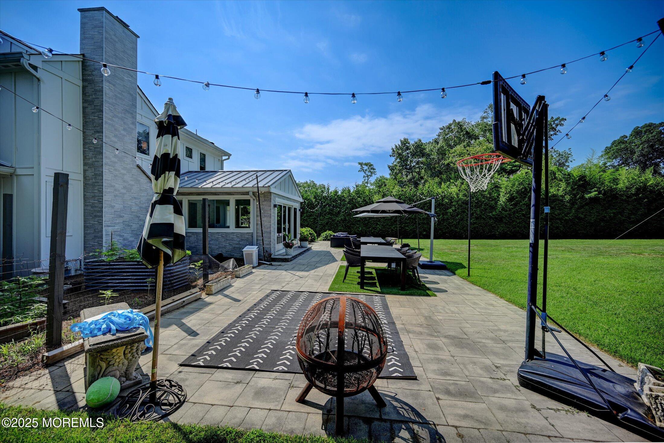 3 Woods Road West Long Branch, NJ 07764 - Photo 34 of 46 a view of backyard with sitting area