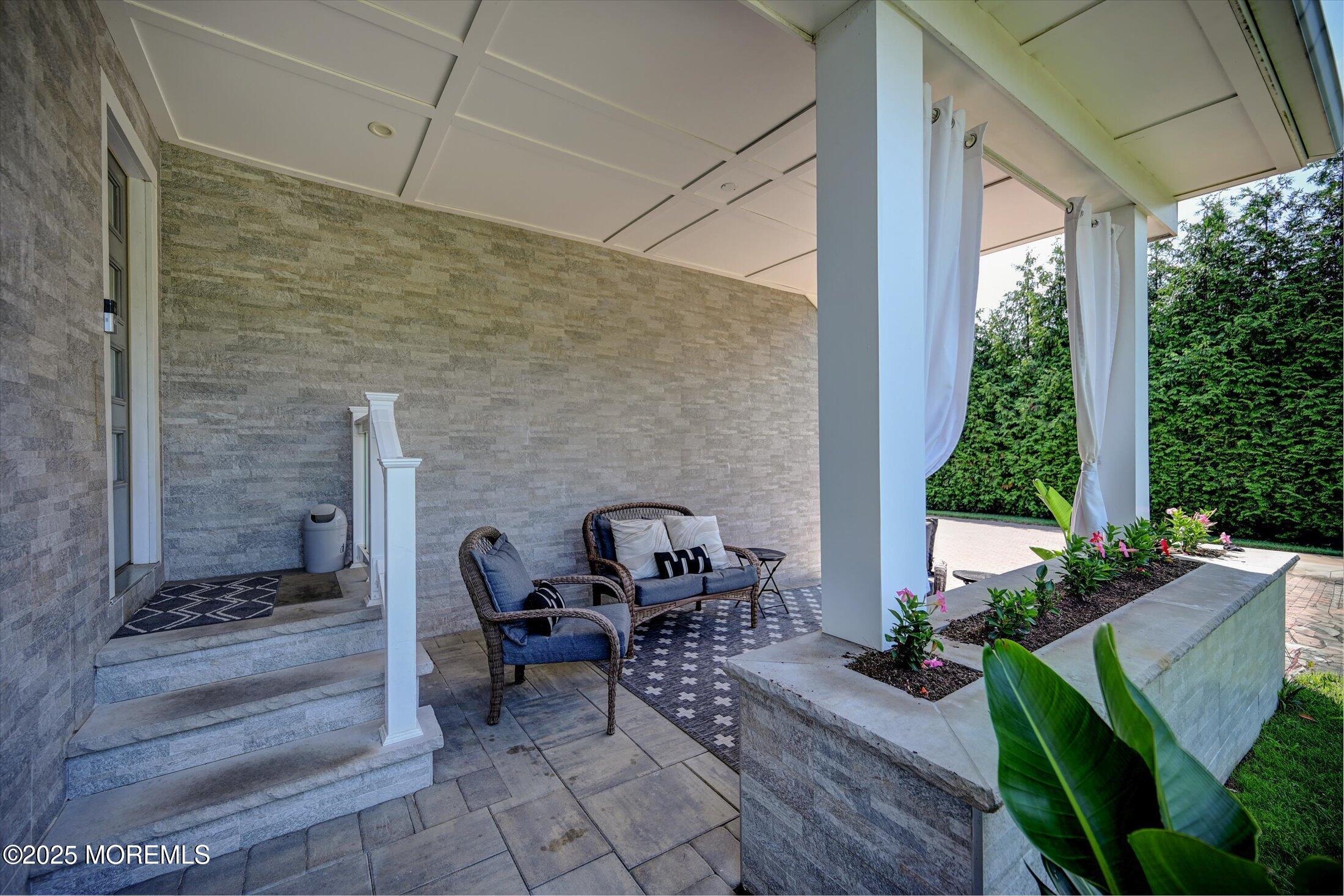 3 Woods Road West Long Branch, NJ 07764 - Photo 38 of 46 a view of backyard with outdoor seating and plants