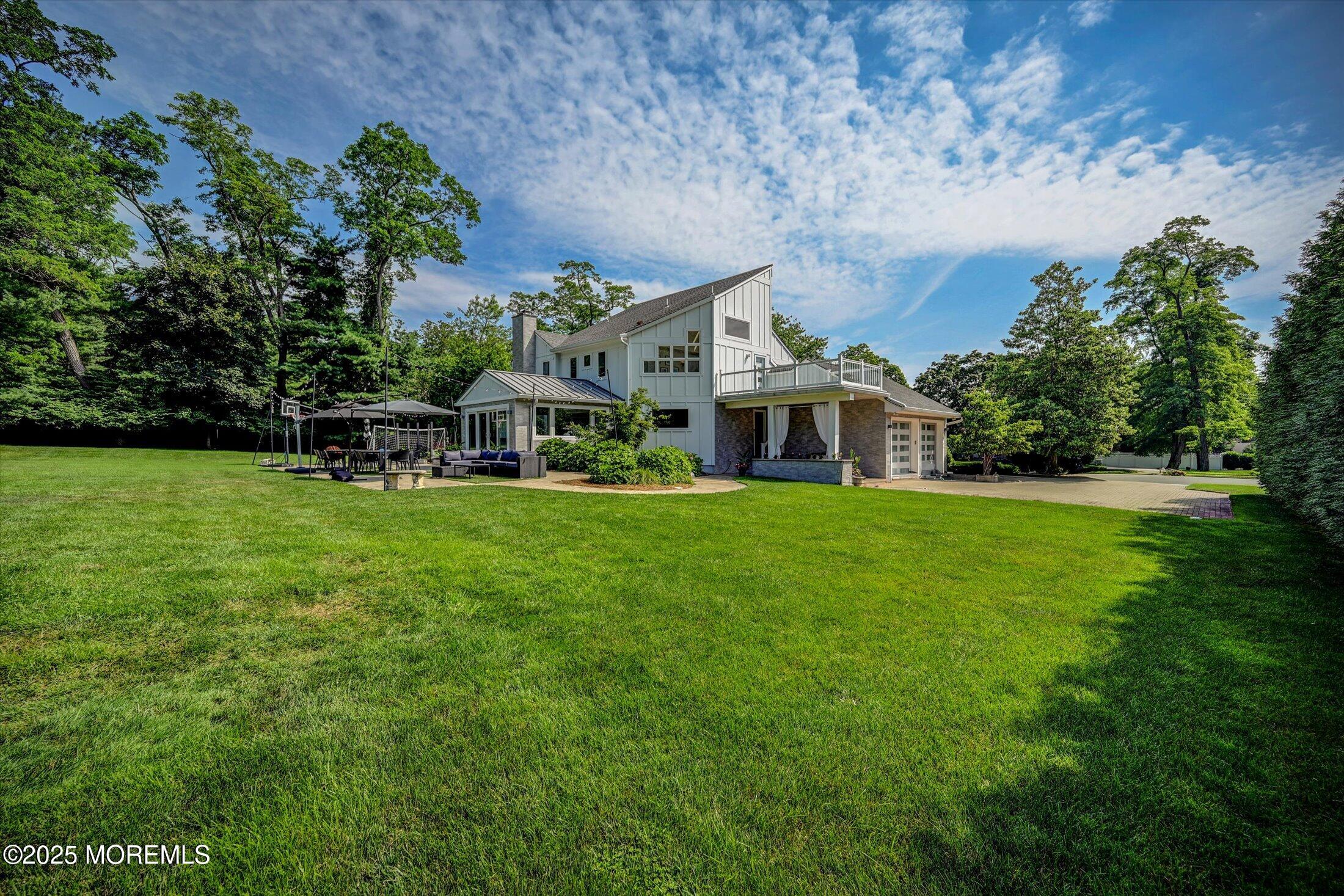 3 Woods Road West Long Branch, NJ 07764 - Photo 40 of 46 a view of house with garden
