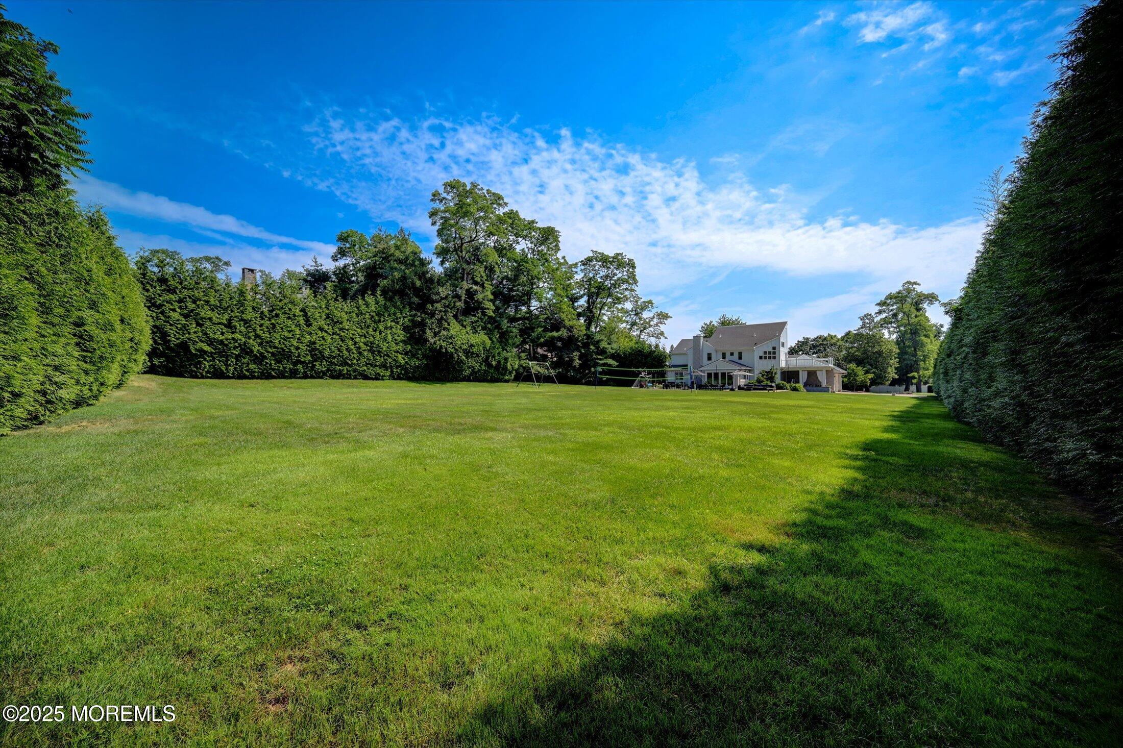 3 Woods Road West Long Branch, NJ 07764 - Photo 42 of 46 a view of a green field with clear sky