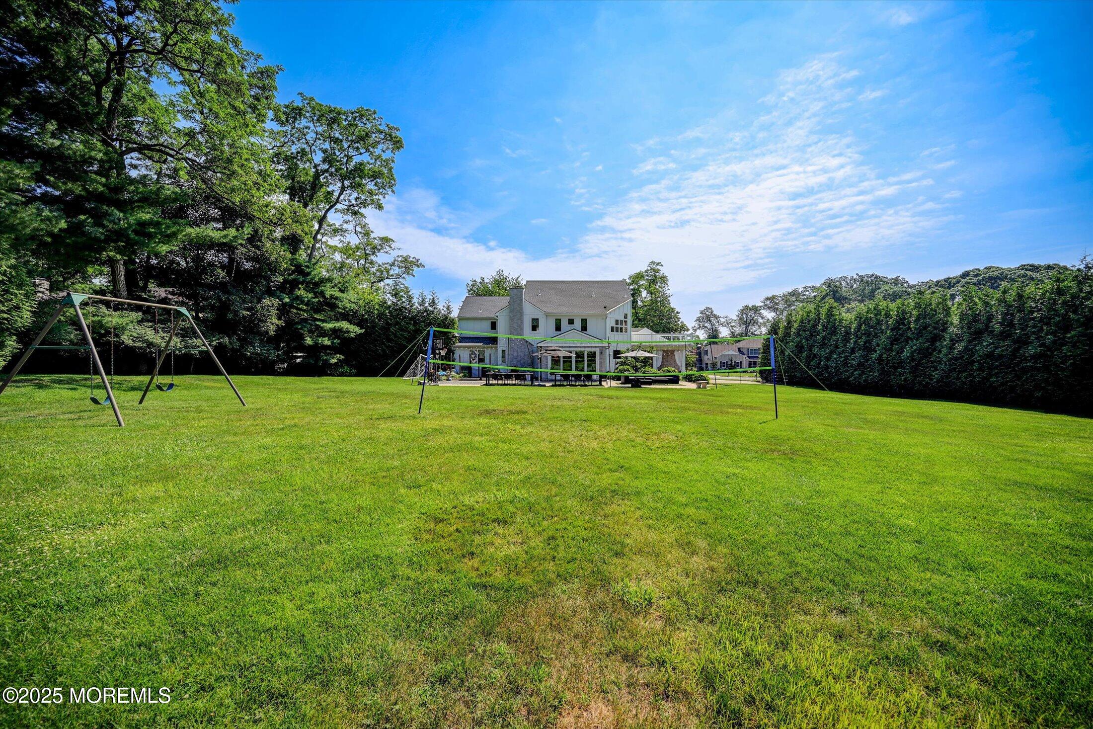 3 Woods Road West Long Branch, NJ 07764 - Photo 43 of 46 a view of a park with large trees