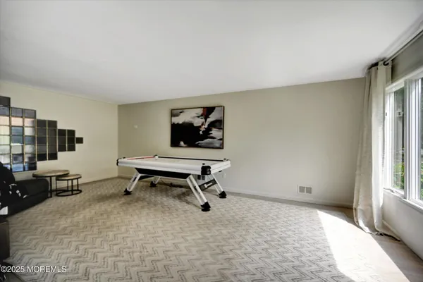 a view of a livingroom with furniture