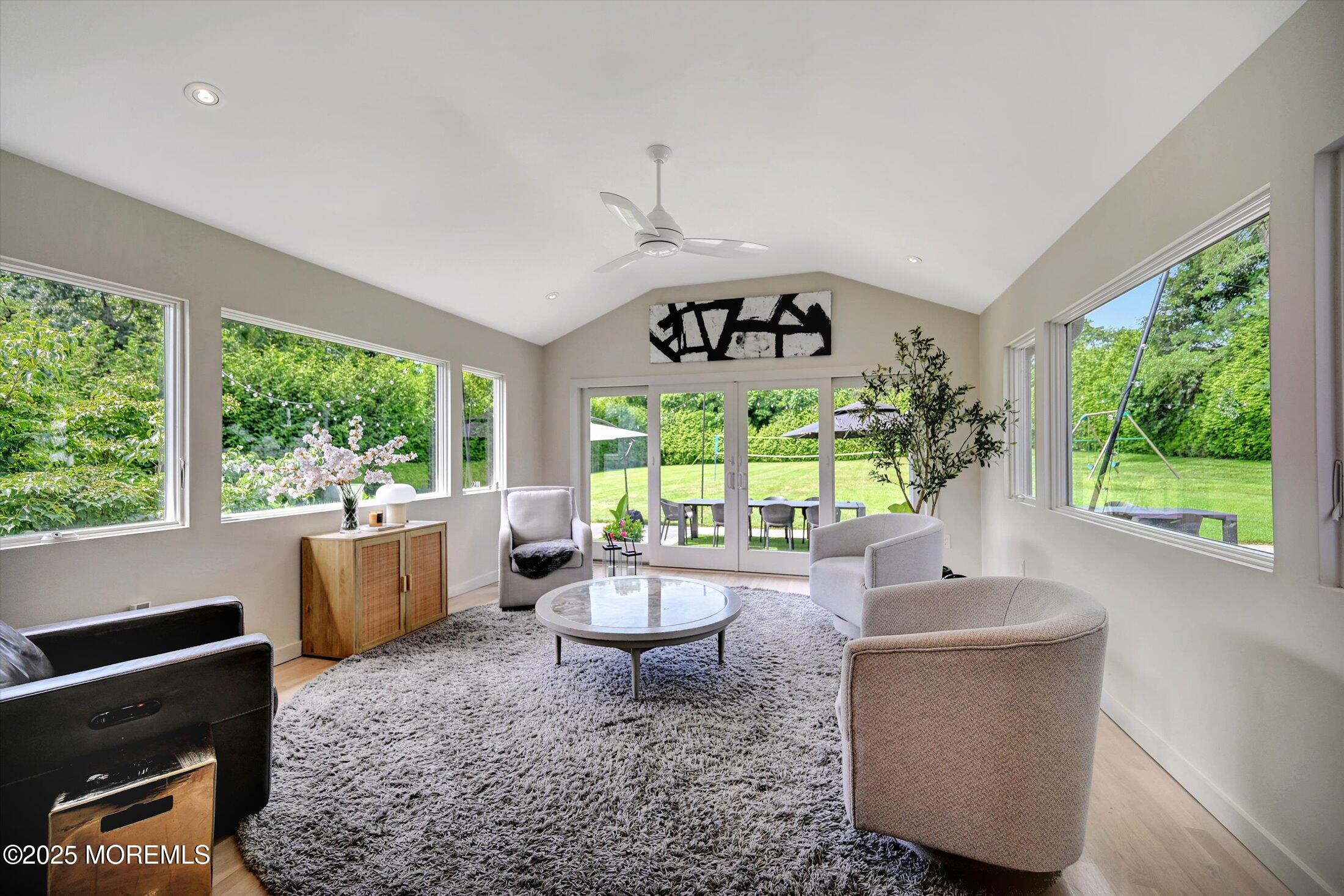 3 Woods Road West Long Branch, NJ 07764 - Photo 9 of 46 a living room with furniture and a large window
