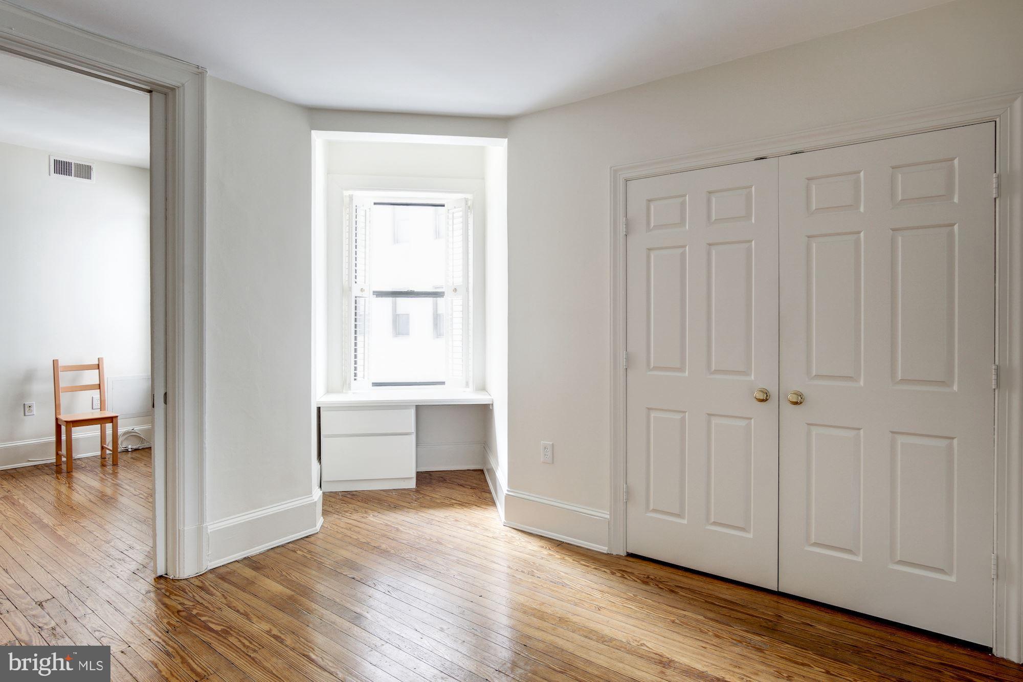 2153 California Street Northwest, Unit 207 Washington, DC 20008 - Photo 20 of 32 Separate Bedroom with Pocket Doors