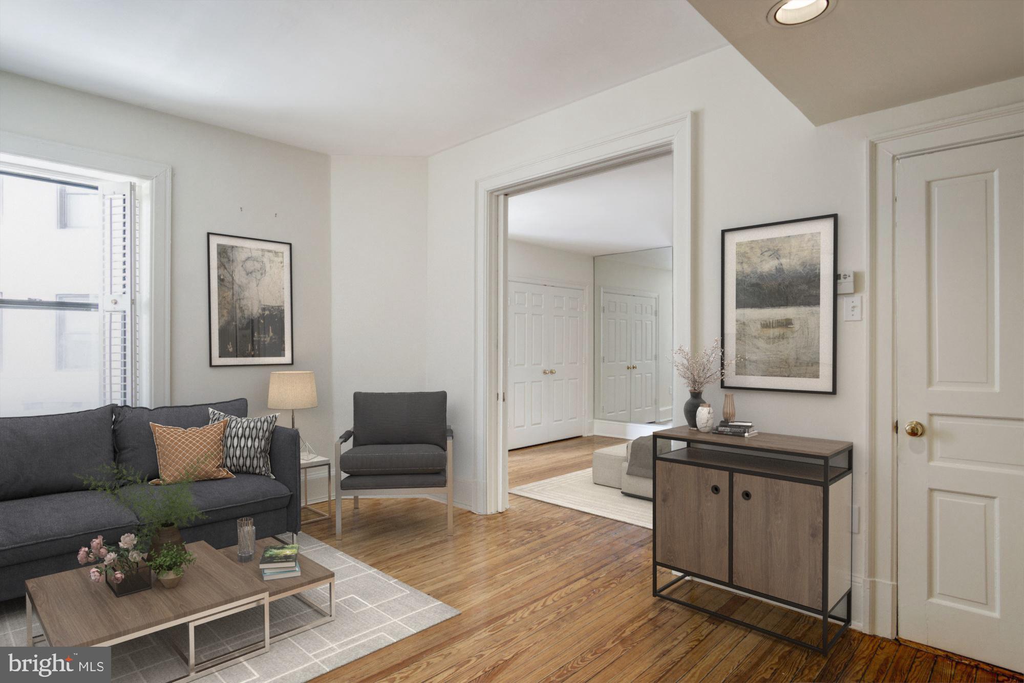 2153 California Street Northwest, Unit 207 Washington, DC 20008 - Photo 2 of 32 Living Room & Separate Bedroom with Pocket Doors