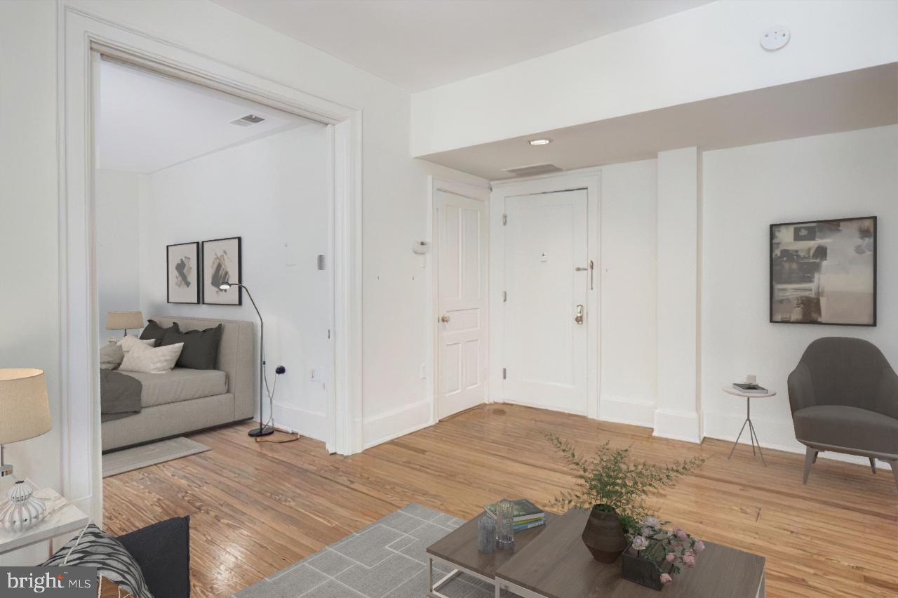 2153 California Street Northwest, Unit 207 Washington, DC 20008 - Photo 6 of 32 Living Room & Separate Bedroom with Pocket Doors
