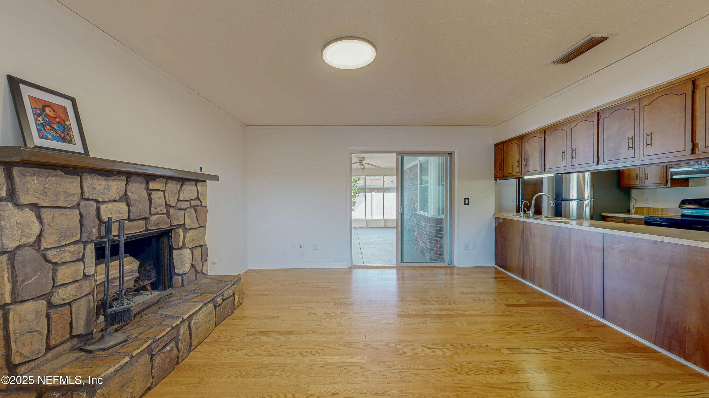 2474 Summer Tree Road East Jacksonville, FL 32246 - Photo 7 of 42 a view of an empty room and window