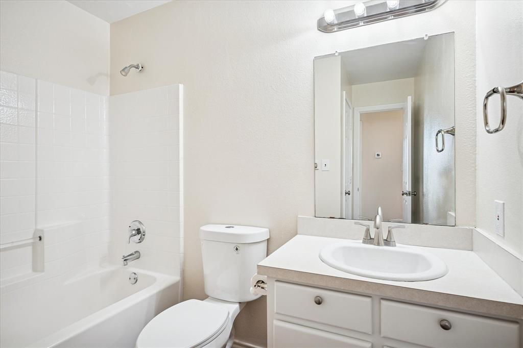 112 Sebastian Lane Josephine, TX 75173 - Photo 13 of 15 a bathroom with a sink toilet and shower