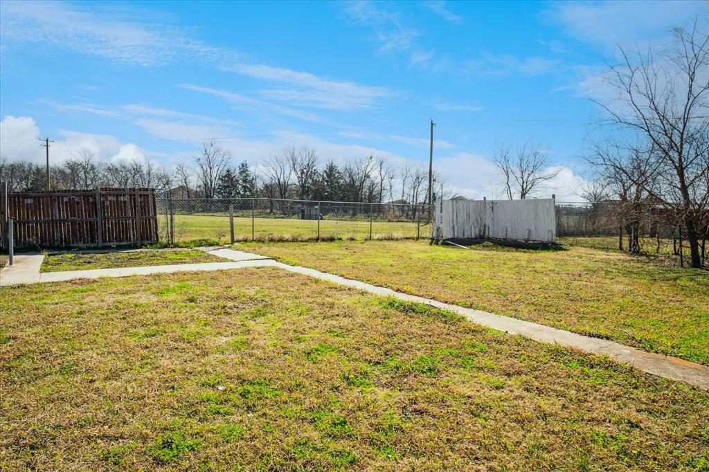 112 Sebastian Lane Josephine, TX 75173 - Photo 14 of 15 a view of a swimming pool with an outdoor space and seating area