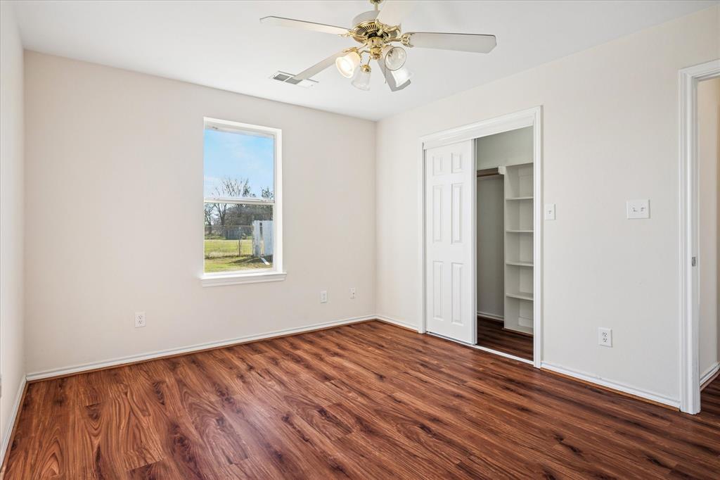 112 Sebastian Lane Josephine, TX 75173 - Photo 9 of 15 a view of empty room with wooden floor