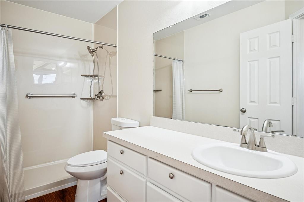112 Sebastian Lane Josephine, TX 75173 - Photo 10 of 15 a bathroom with a sink toilet and shower