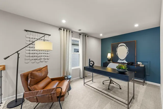 a view of a workspace with furniture