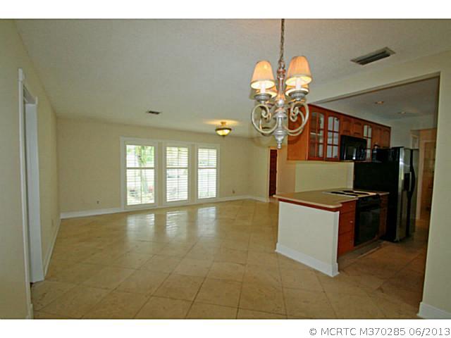 1144 Northwest Spruce Ridge Drive Stuart, FL 34994 - Photo 13 of 25 Exterior Front. Dining Room