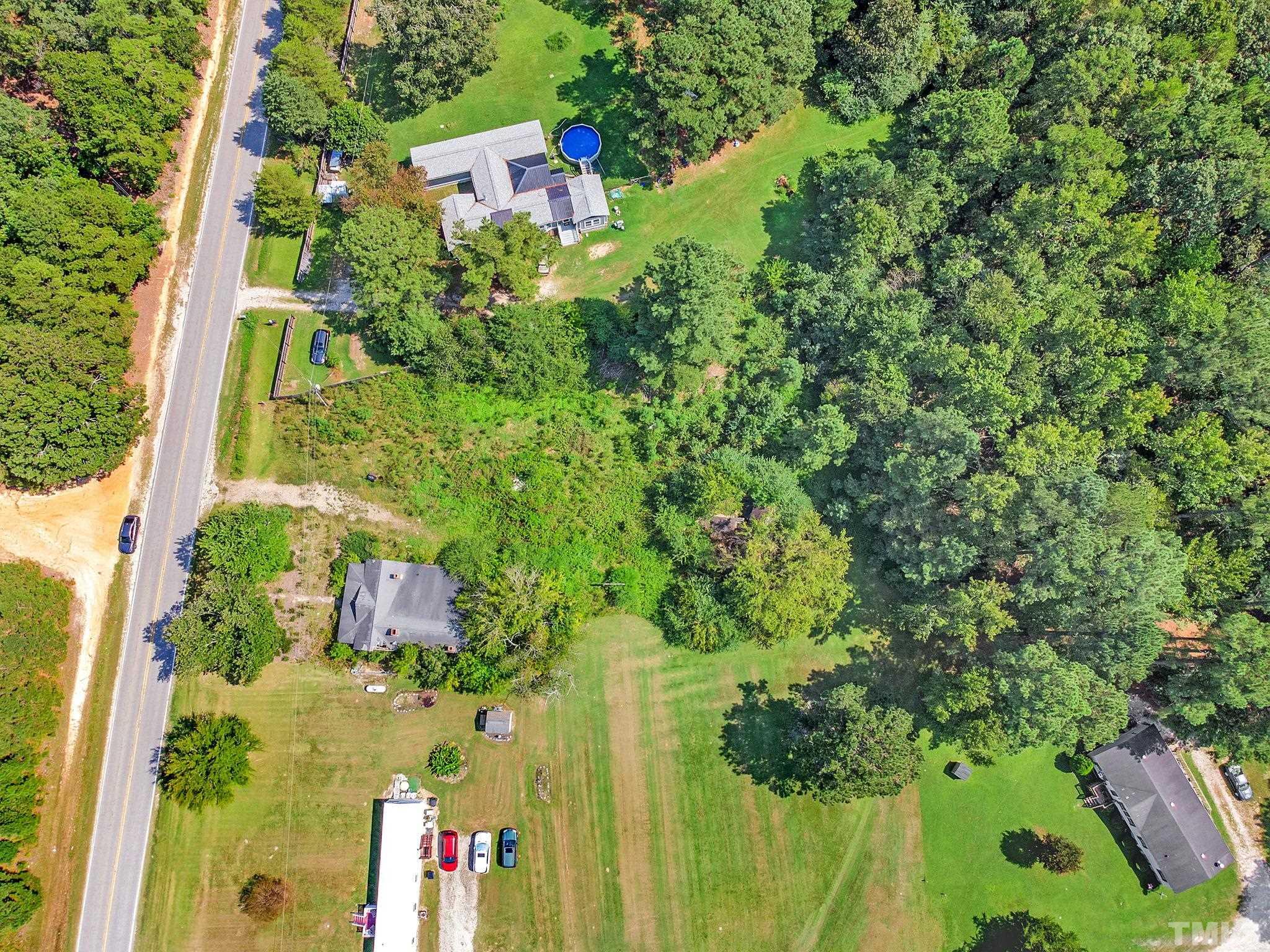 6200 Riley Hill Road Wendell, NC 27591 - Photo 8 of 12 an aerial view of residential house with an outdoor space