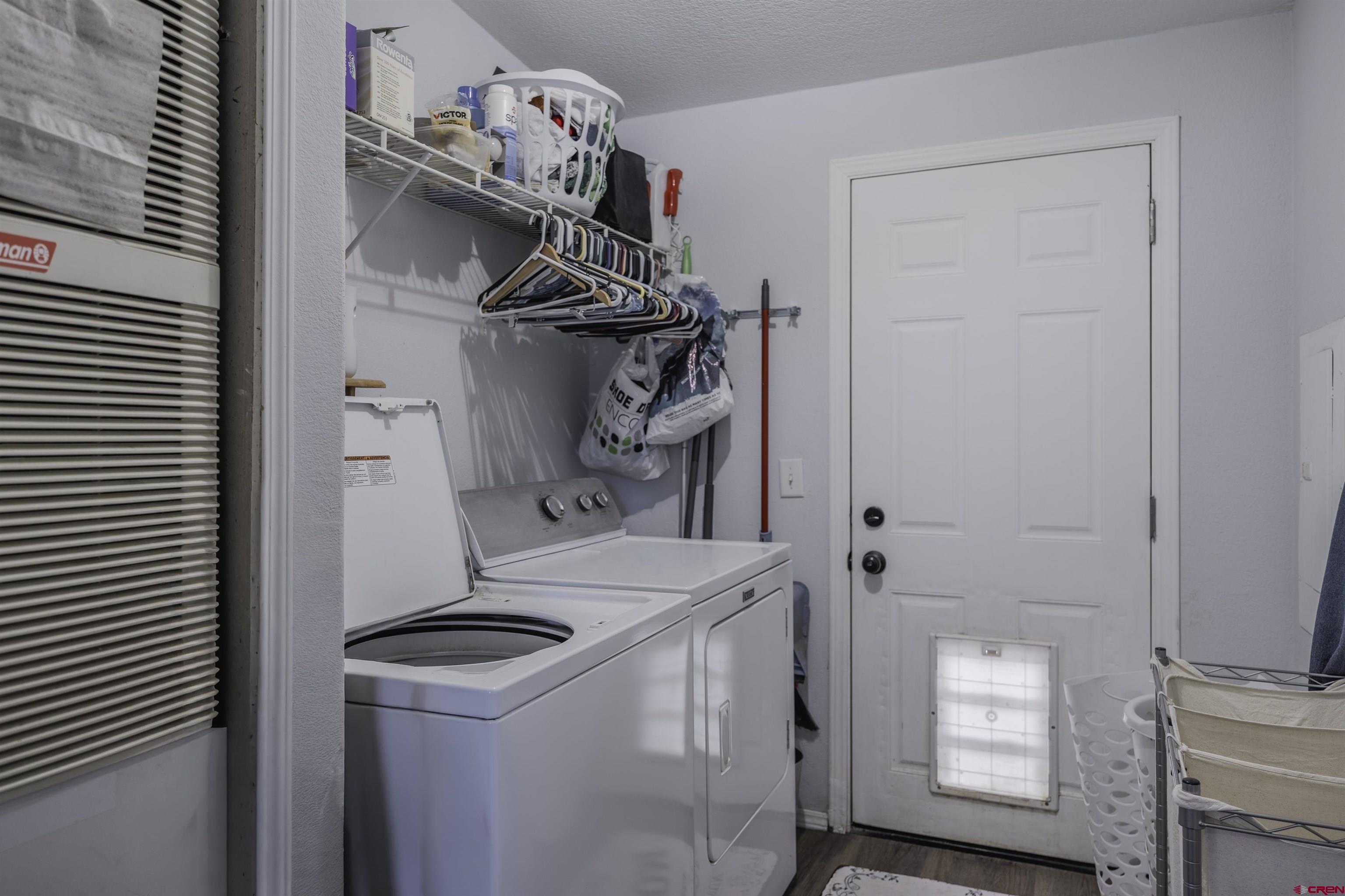 3847 5725th Road Olathe, CO 81425 - Photo 14 of 26 a utility room with dryer and washer
