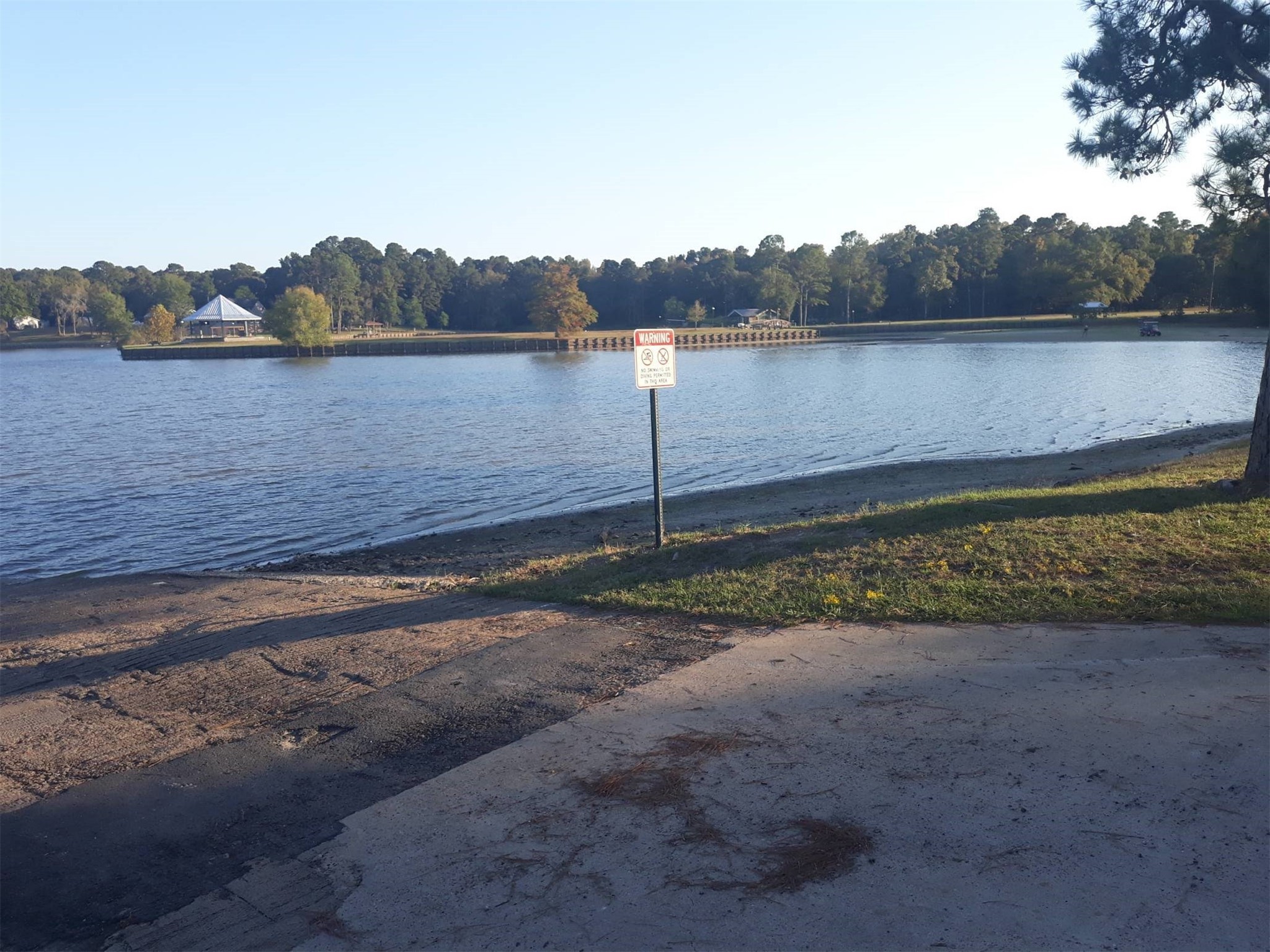 63 Whippoorwill Lane Trinity, TX 75862 - Photo 2 of 6 a view of a lake with a mountain in the background