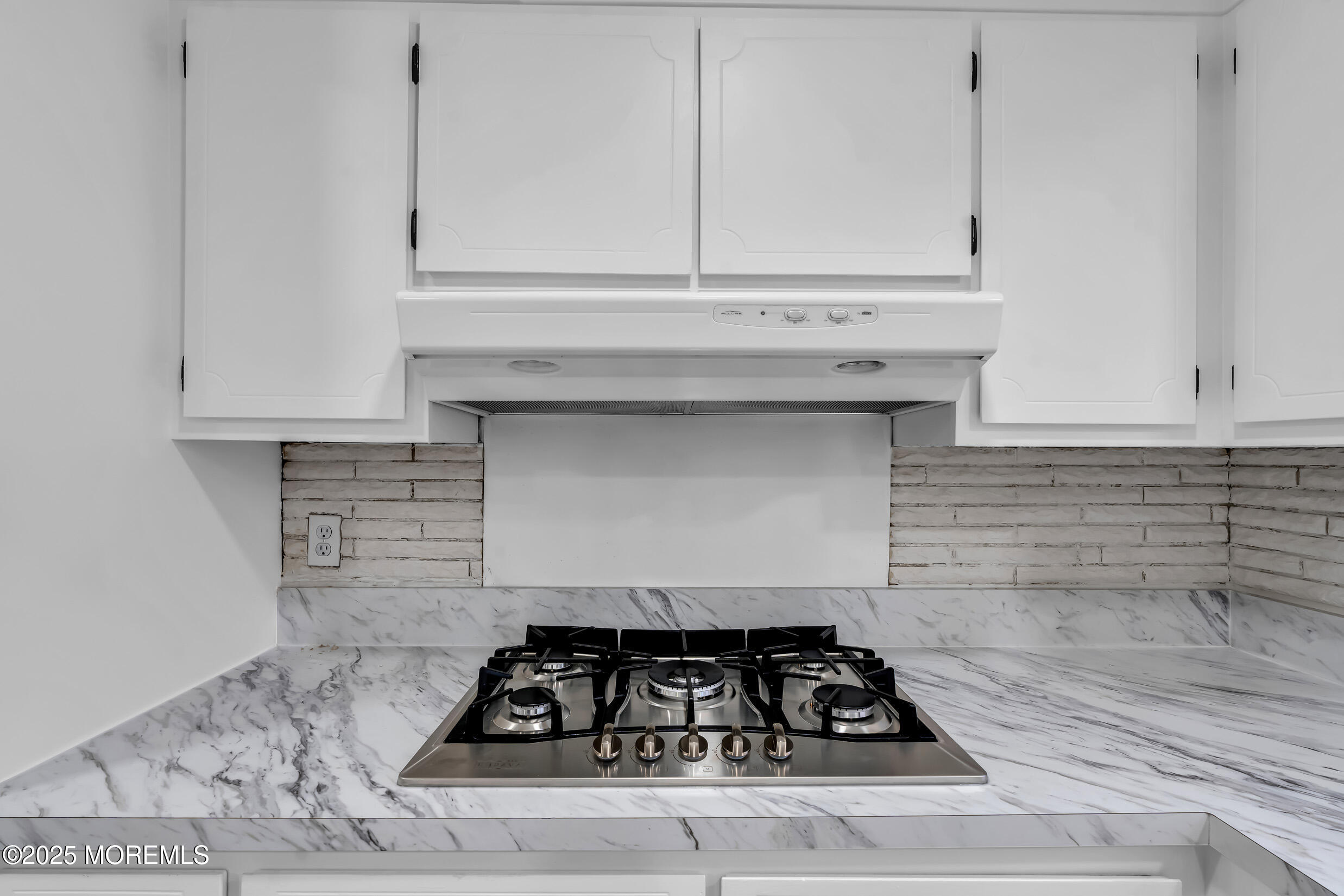 16 Burdge Drive Howell, NJ 07731 - Photo 16 of 43 a white stove top oven sitting inside of a kitchen