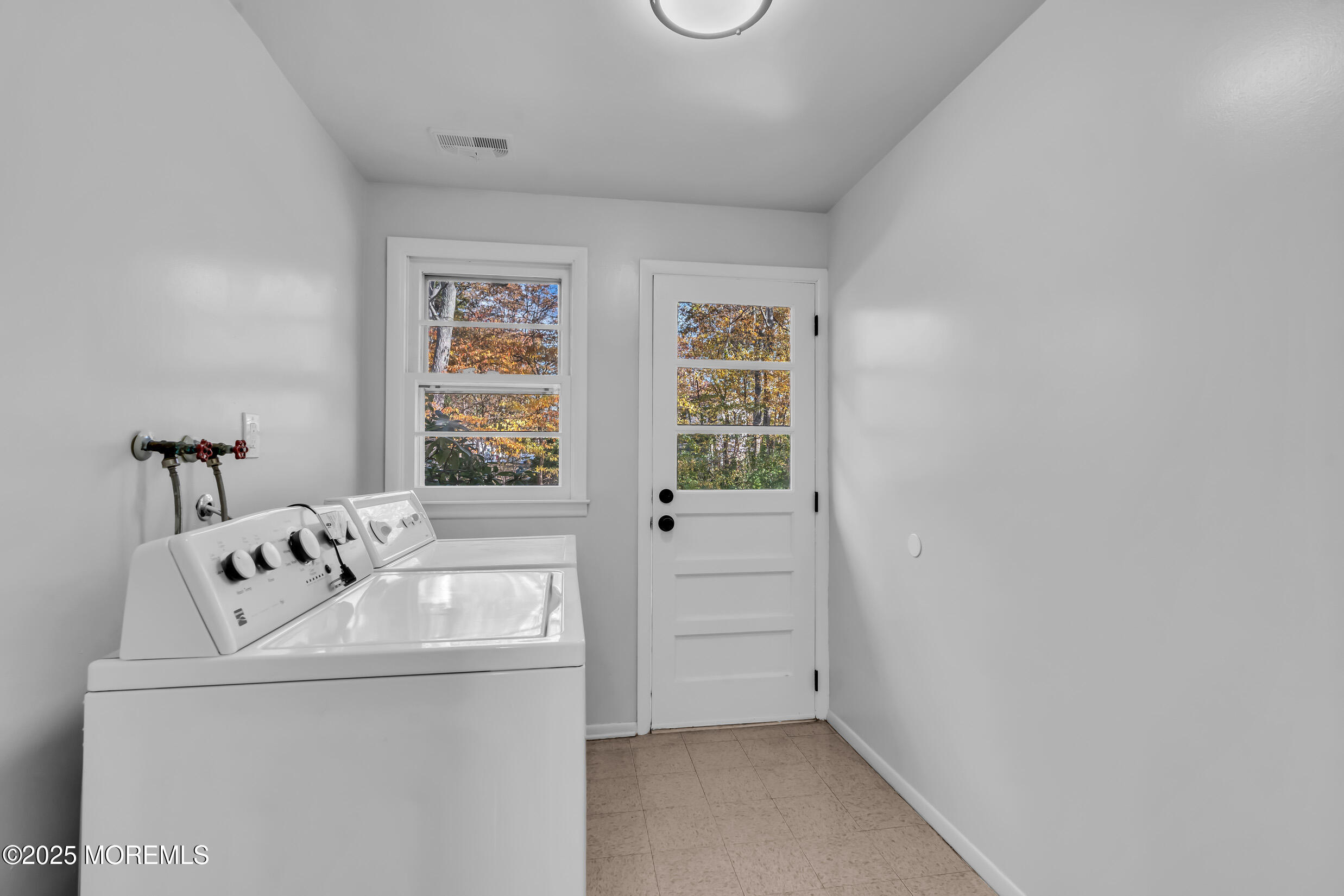 16 Burdge Drive Howell, NJ 07731 - Photo 31 of 43 a white bath tub sitting next to a window