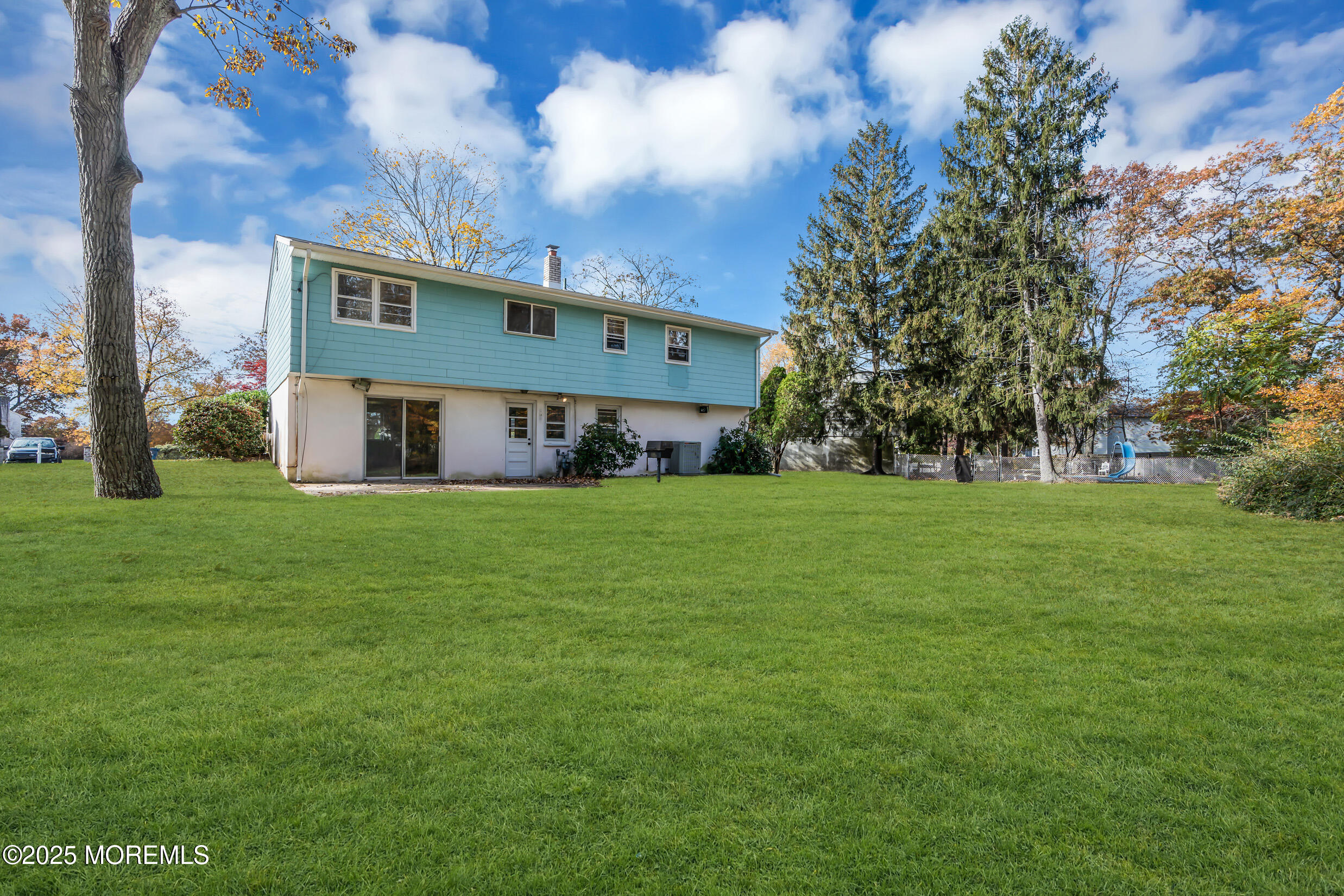 16 Burdge Drive Howell, NJ 07731 - Photo 39 of 43 a front view of house with garden