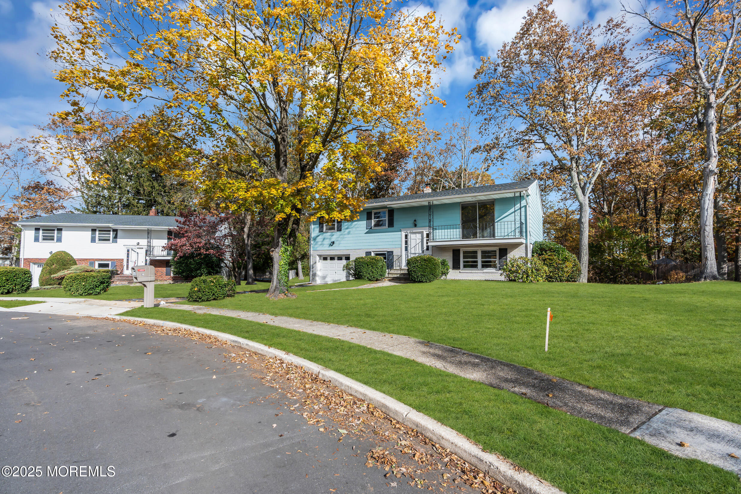 16 Burdge Drive Howell, NJ 07731 - Photo 42 of 43 a front view of a house with a yard