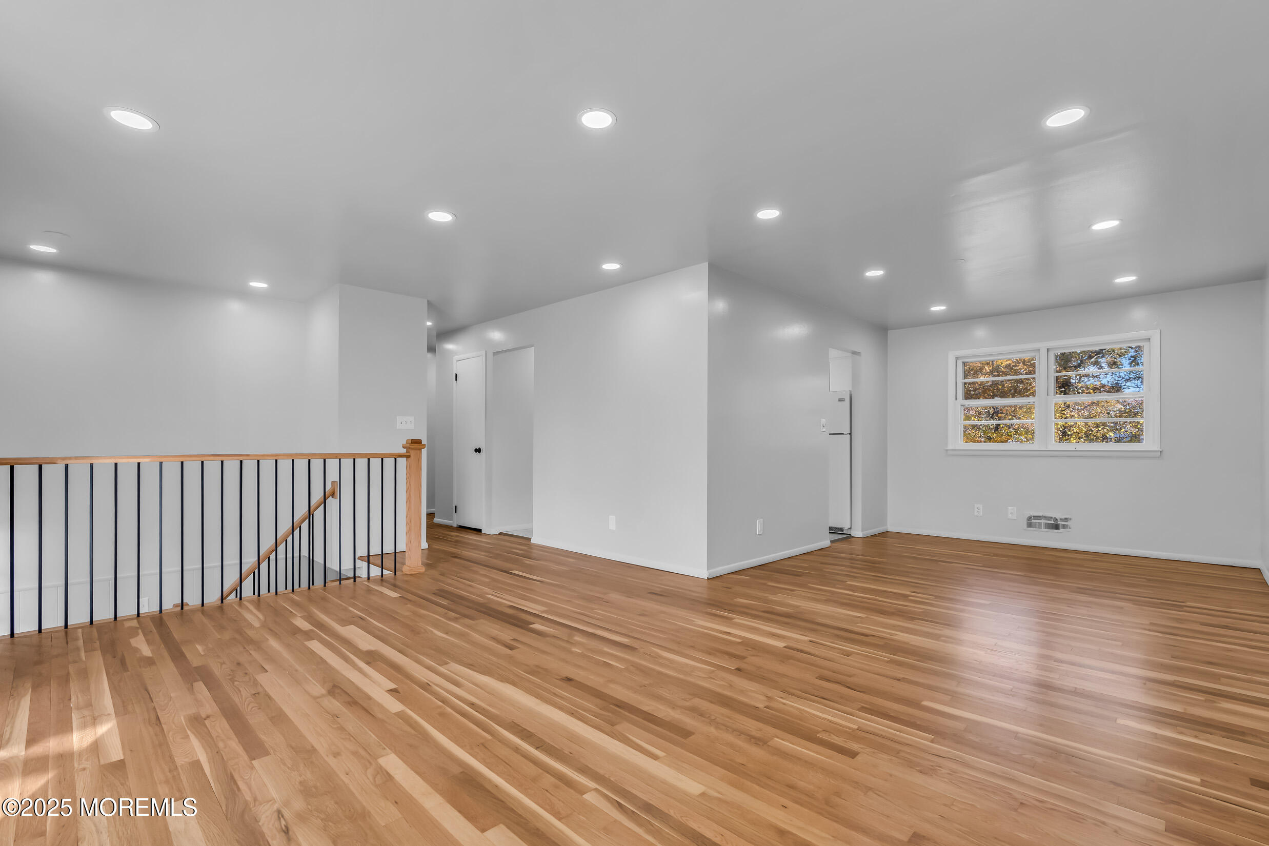 16 Burdge Drive Howell, NJ 07731 - Photo 6 of 43 a view of an empty room with wooden floor