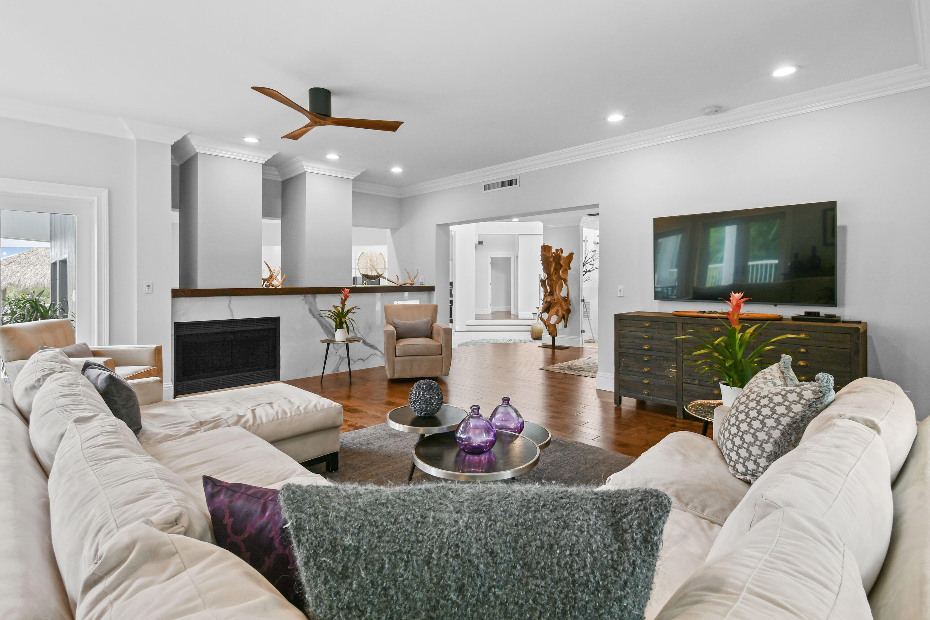 10561 Southeast Le Parc Jupiter, FL 33469 - Photo 16 of 80 a living room with furniture and a flat screen tv
