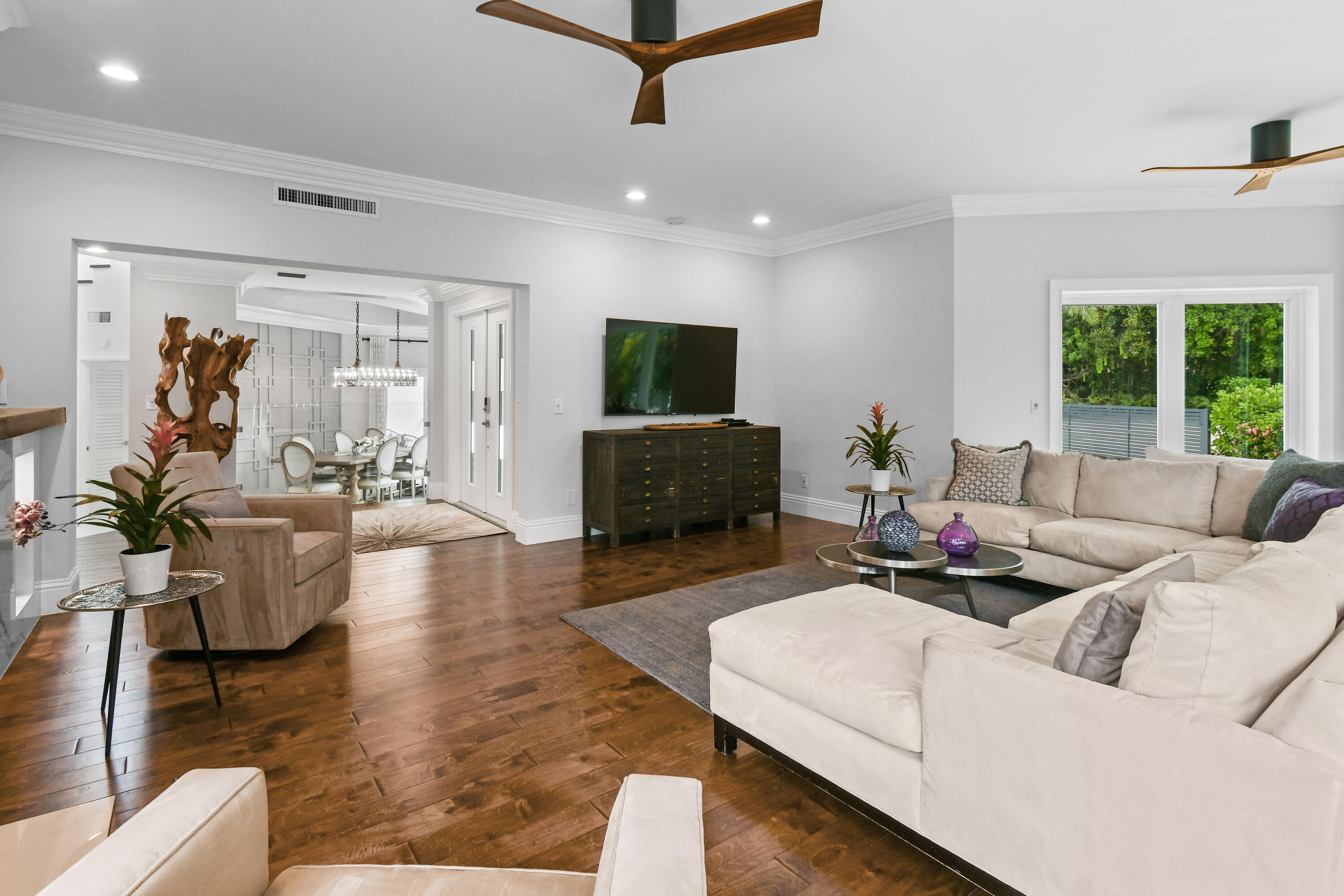 10561 Southeast Le Parc Jupiter, FL 33469 - Photo 17 of 80 a living room with furniture and a flat screen tv
