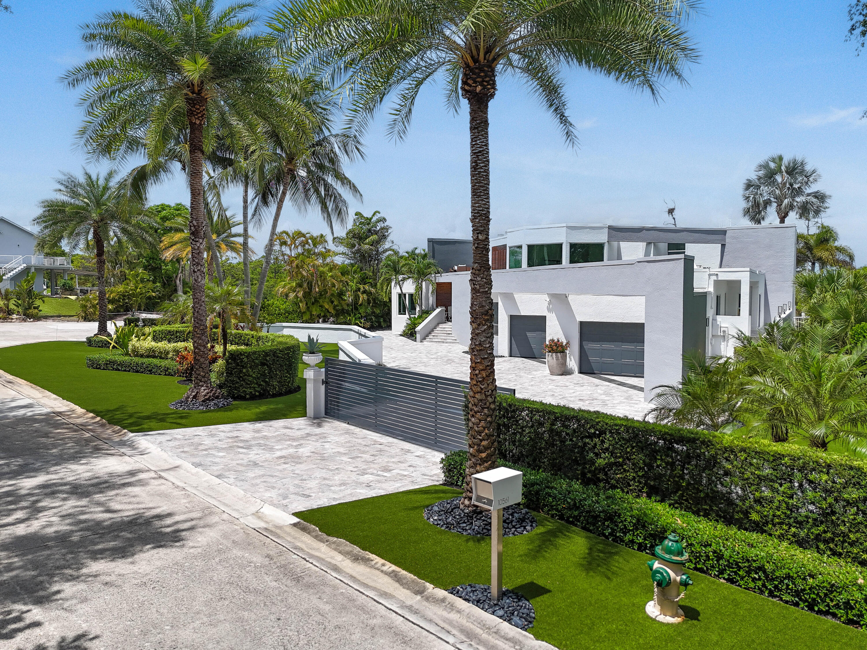 10561 Southeast Le Parc Jupiter, FL 33469 - Photo 80 of 80 a swimming pool with outdoor seating and yard