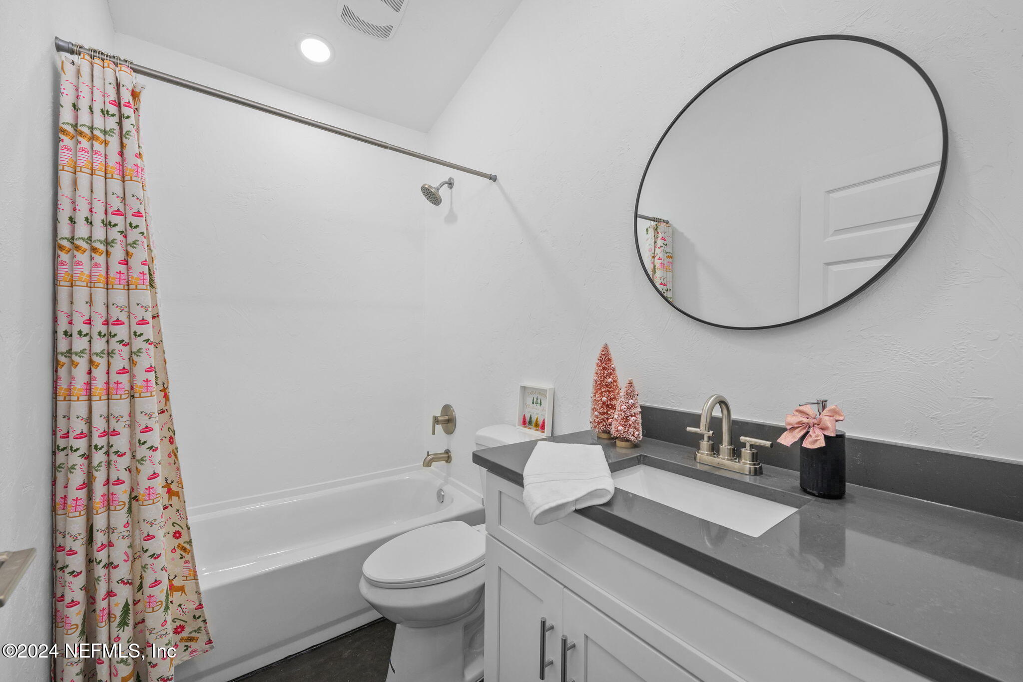 1409 High Street Palatka, FL 32177 - Photo 9 of 23 a bathroom with a sink toilet and shower