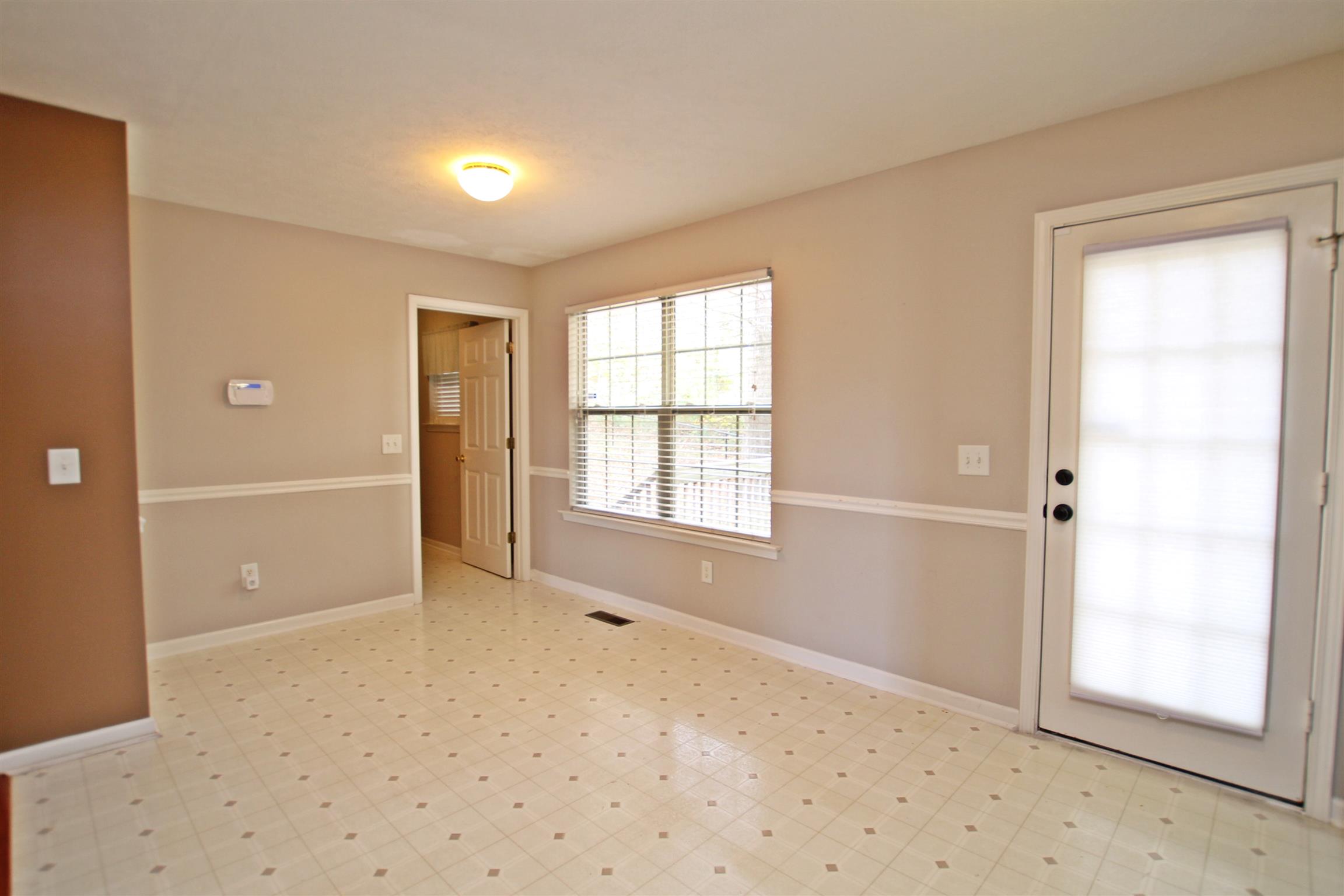 808 Hunters Crossing Lane Springfield, TN 37172 - Photo 12 of 30 a view of an empty room with a window