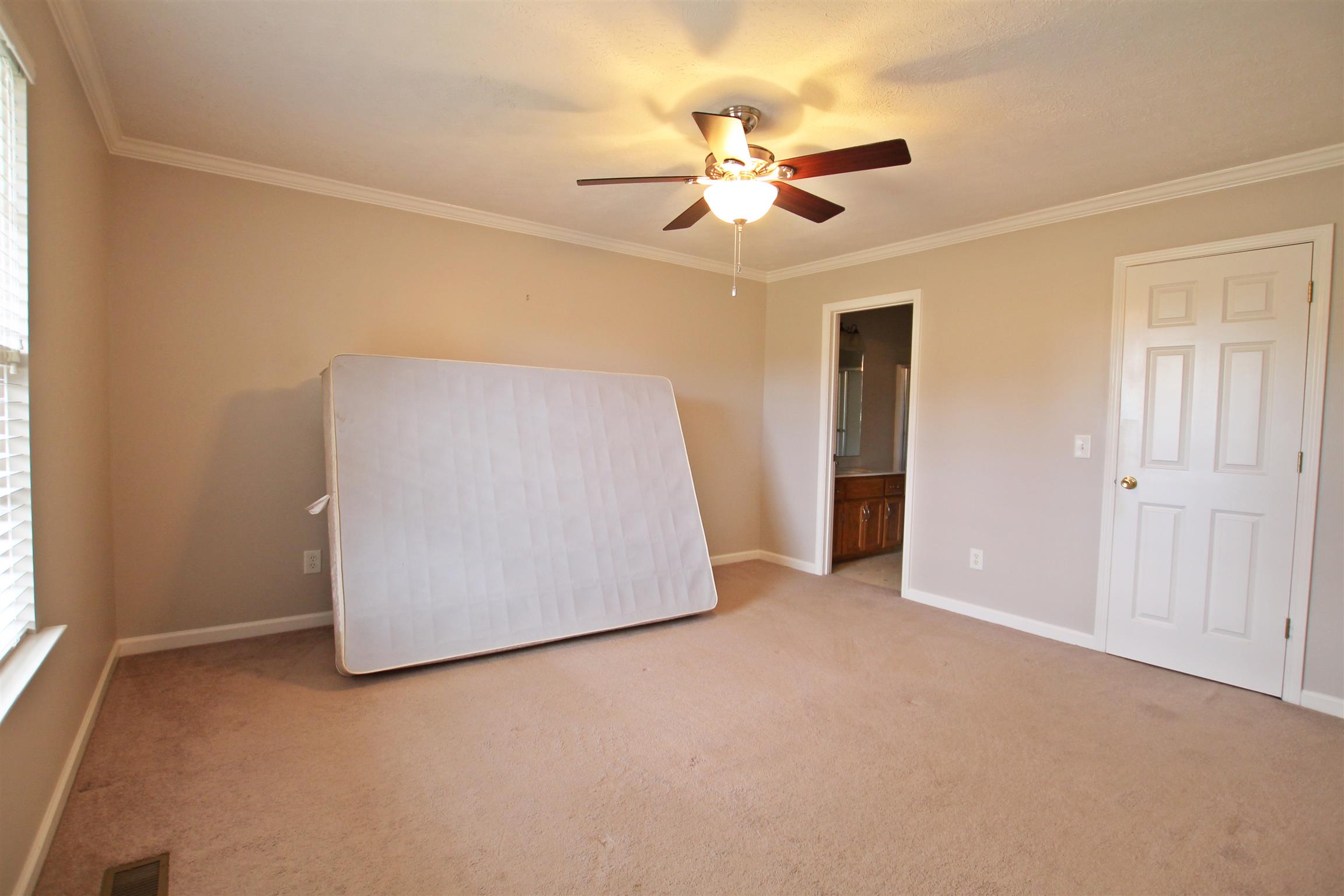 808 Hunters Crossing Lane Springfield, TN 37172 - Photo 14 of 30 an empty room with windows and fan