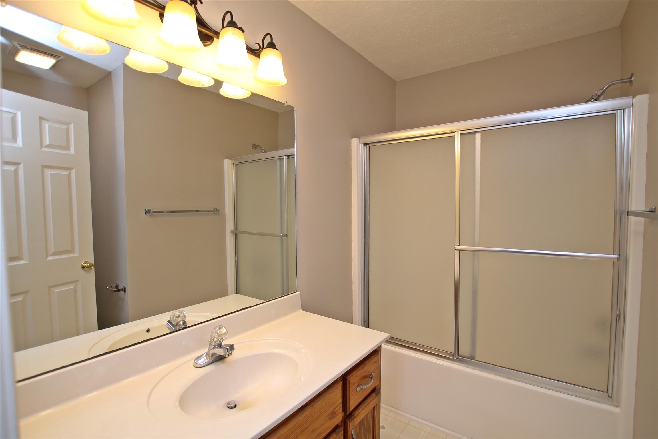 808 Hunters Crossing Lane Springfield, TN 37172 - Photo 17 of 30 a bathroom with a sink and a mirror