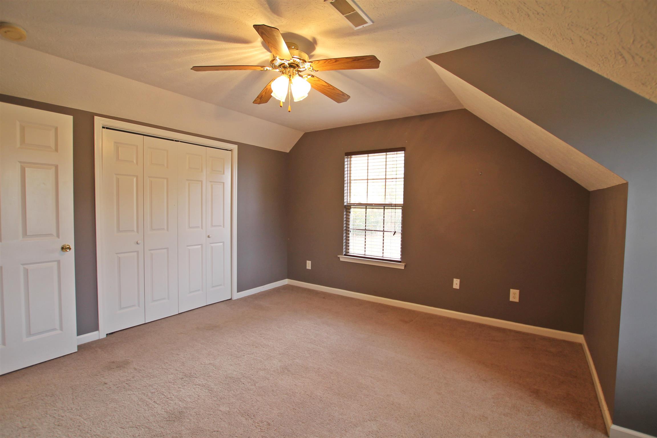 808 Hunters Crossing Lane Springfield, TN 37172 - Photo 21 of 30 an empty room with windows and fan