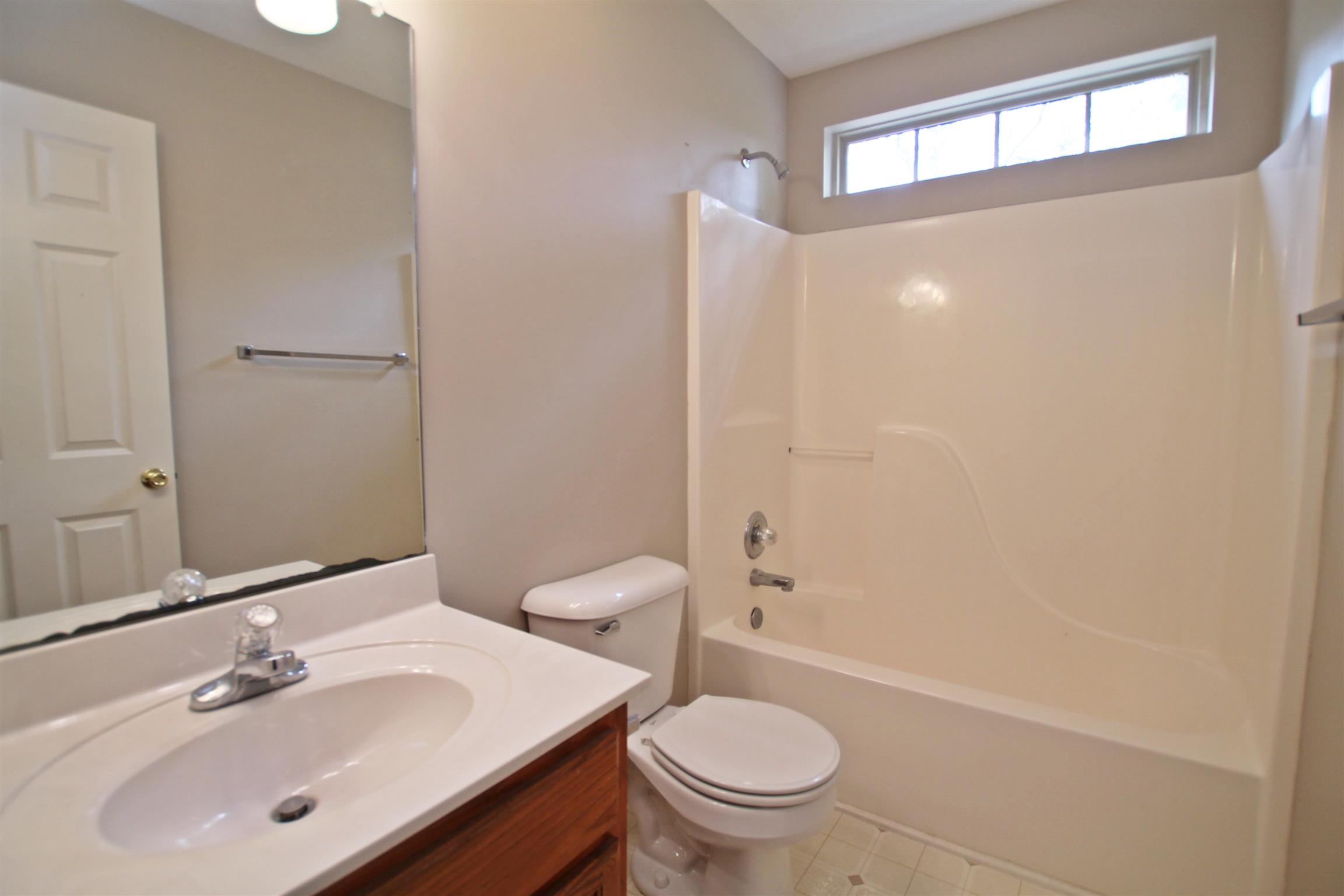 808 Hunters Crossing Lane Springfield, TN 37172 - Photo 22 of 30 a bathroom with a sink toilet and shower