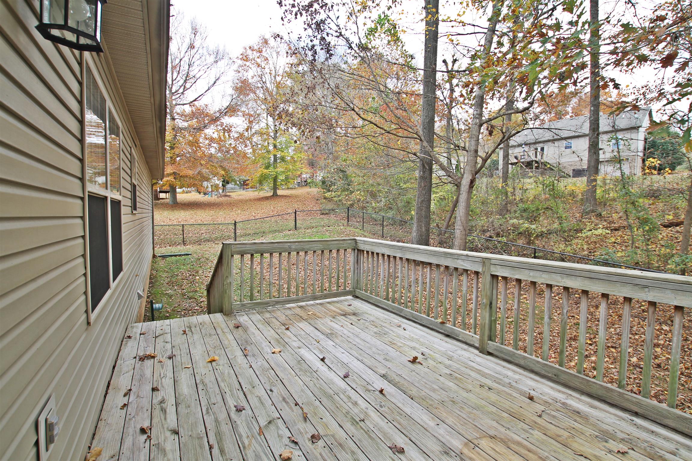 808 Hunters Crossing Lane Springfield, TN 37172 - Photo 26 of 30 a view of balcony with wooden floor and fence
