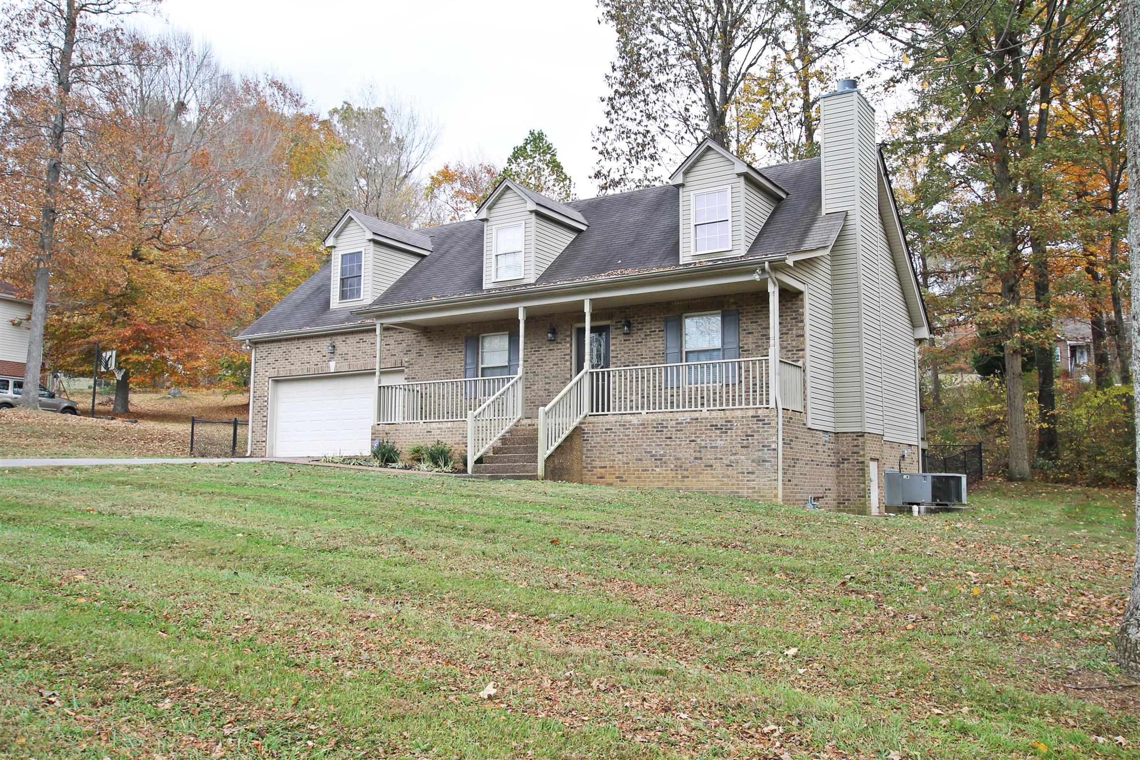 808 Hunters Crossing Lane Springfield, TN 37172 - Photo 30 of 30 a view of a yard in front of a house with large tree