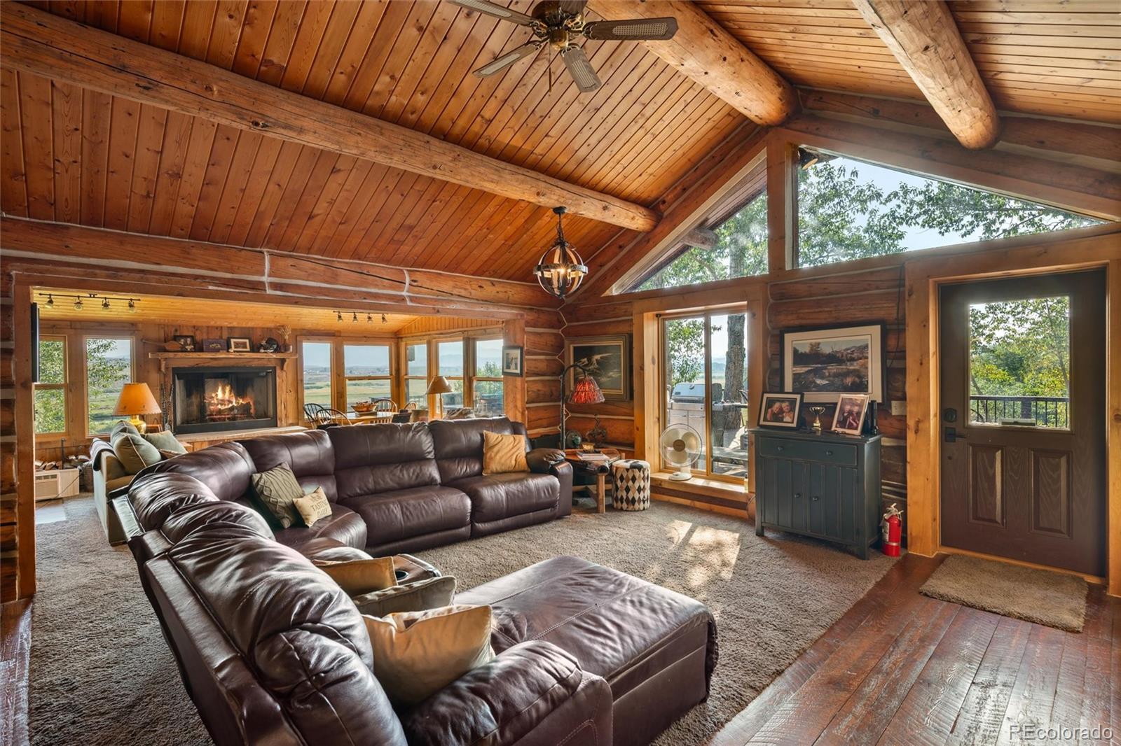 1853 County Road Kremmling, CO 80459 - Photo 22 of 50 a living room with furniture a wooden floor and a window