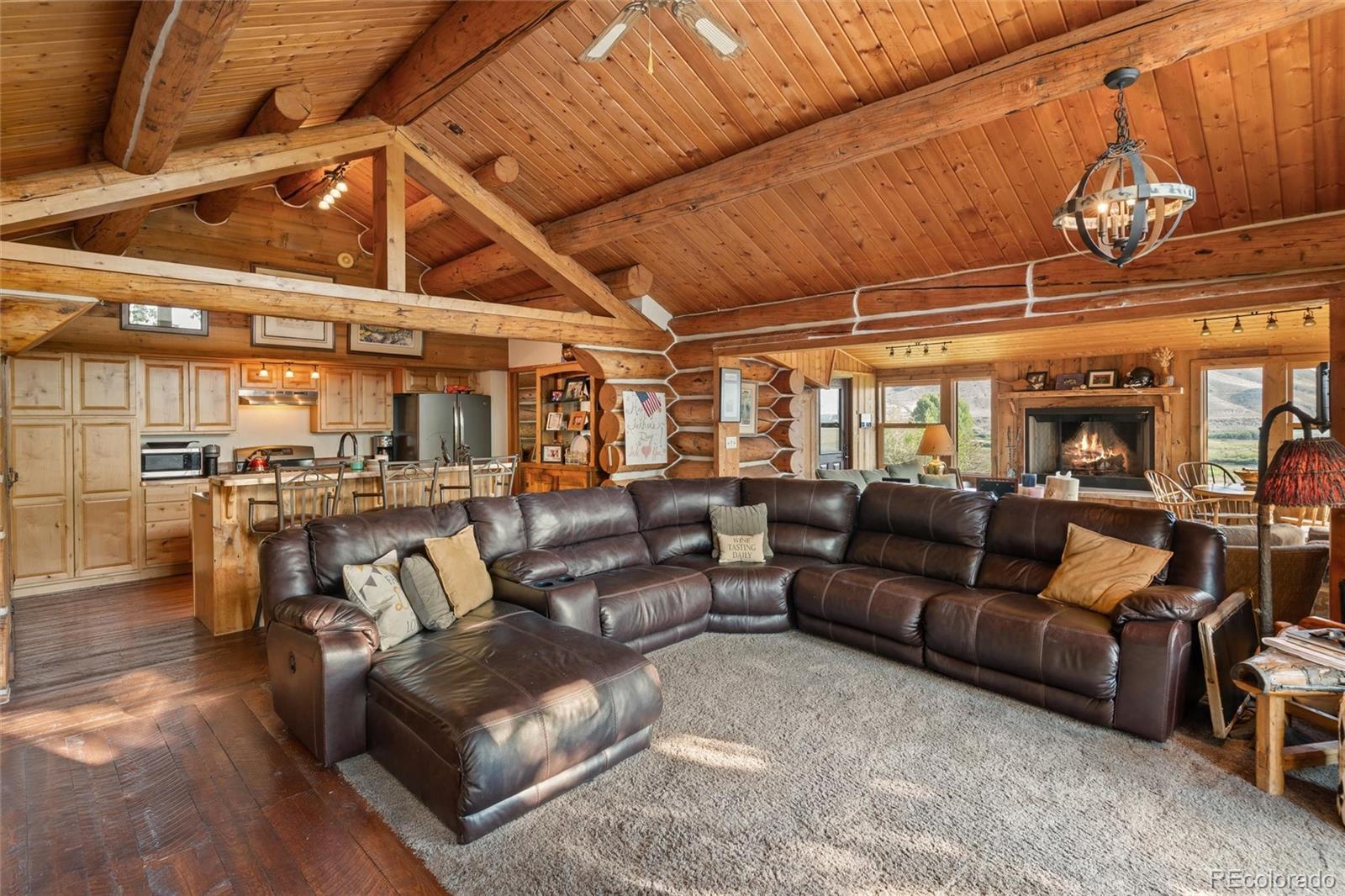 1853 County Road Kremmling, CO 80459 - Photo 23 of 50 a media room with lots of chairs and a table
