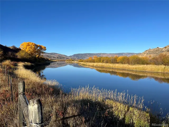 a view of a lake with a mountain in the background