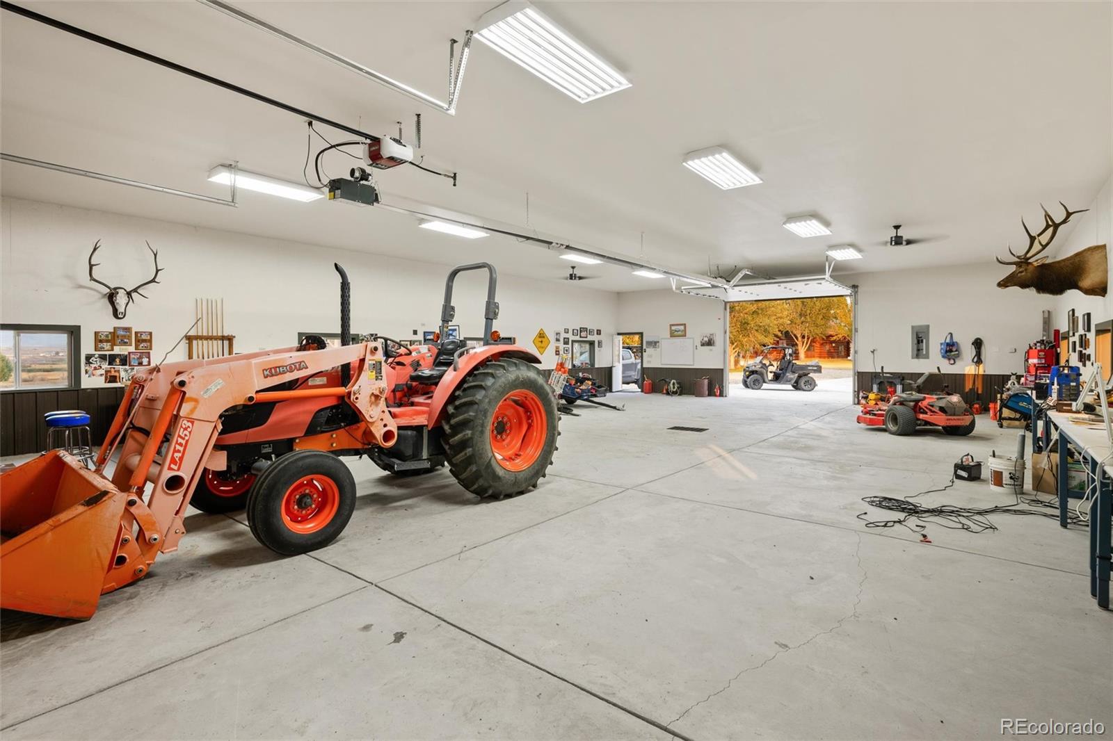 1853 County Road Kremmling, CO 80459 - Photo 47 of 50 a view of parking garage with cars and other equipment