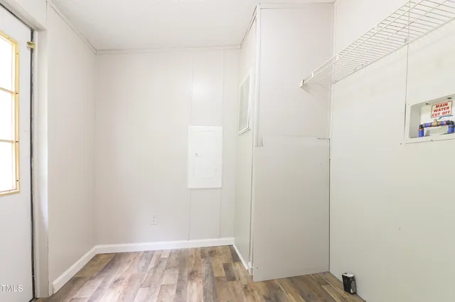 a view of a room that has a window in it